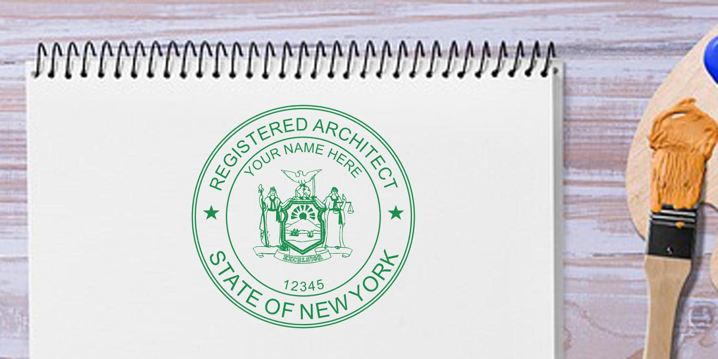 New York architect seal on sketchbook with paintbrush and palette, showcasing affordable architect stamp options and pricing.