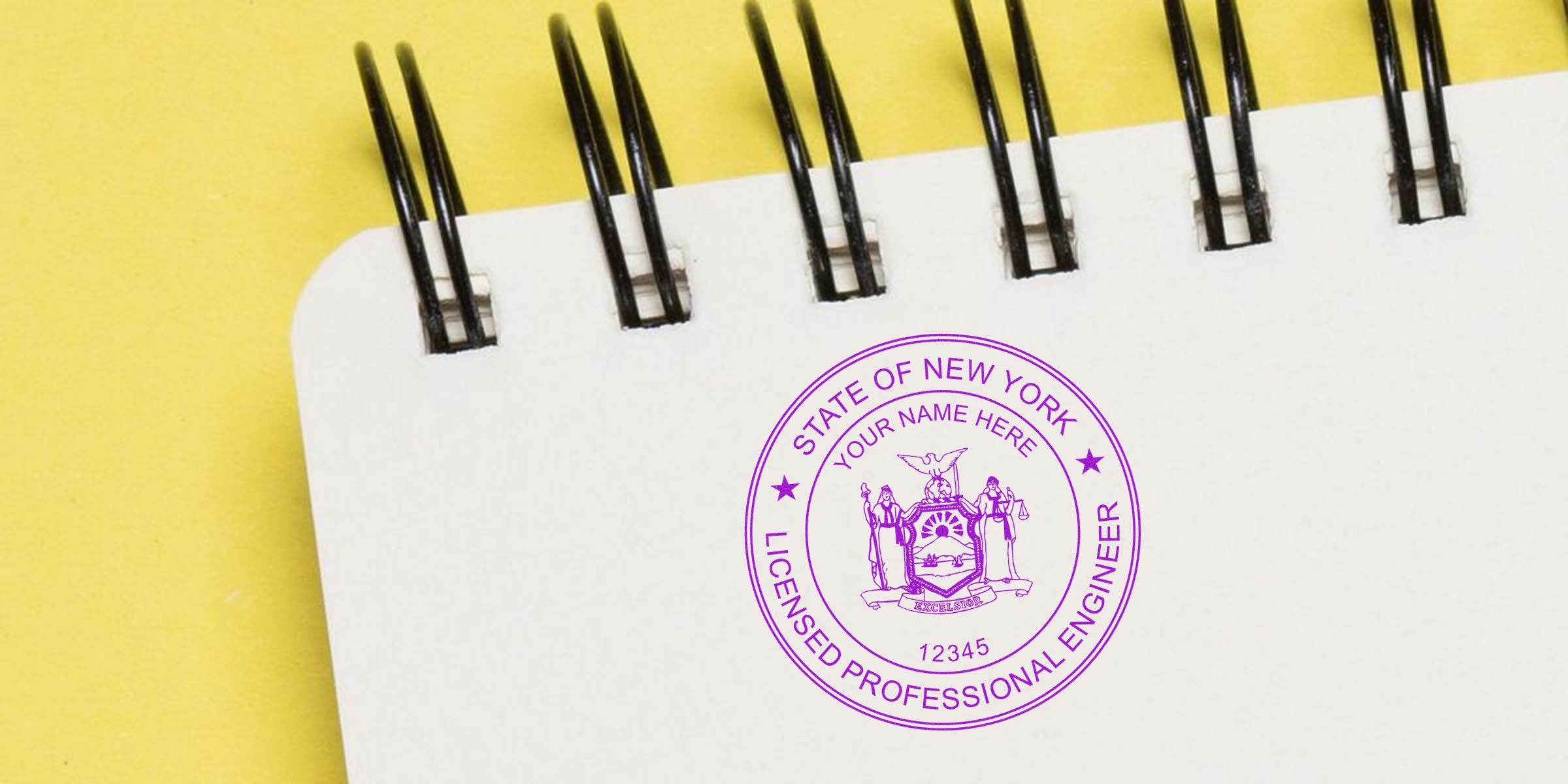 New York engineer stamp on spiral notebook with yellow background, showing licensed professional engineer seal and application.