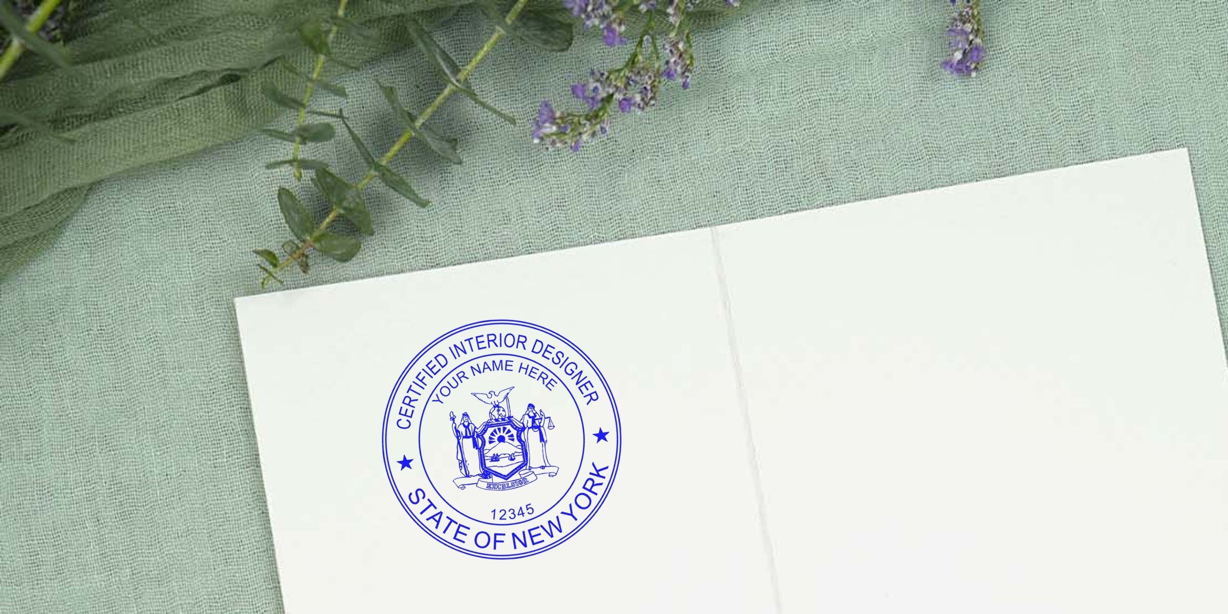 Certified interior designer stamp on white paper with New York state emblem, framed by decorative plants, representing New York interior design rules and stamp requirements.