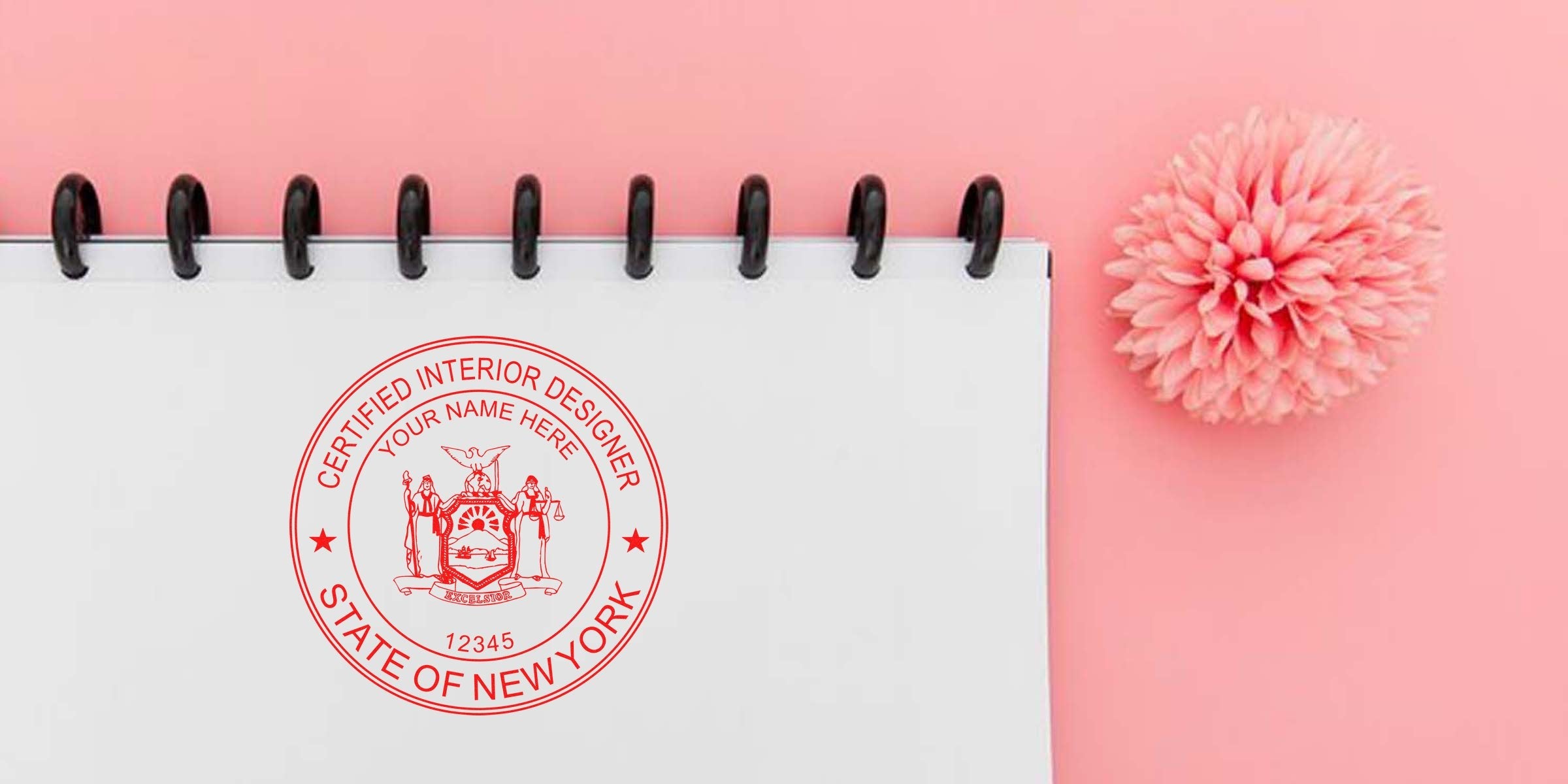 Affordable interior designer stamp on notebook with pink flower, New York interior design certification seal on pink background.