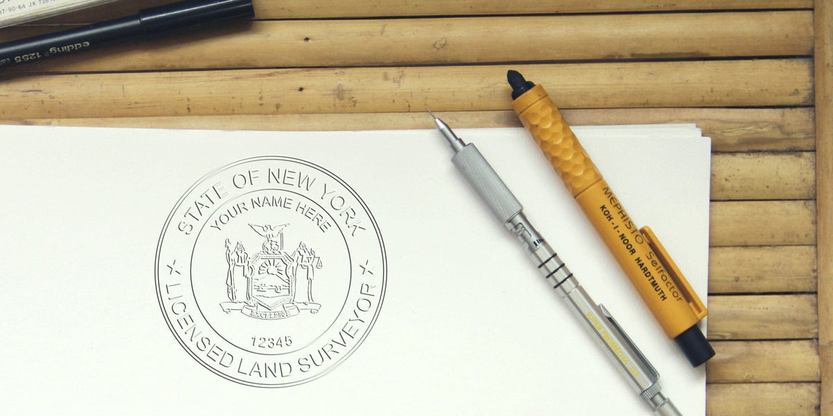 New York land surveyor seal on white paper with technical drawing pens on wooden table, showing common seal mistakes.