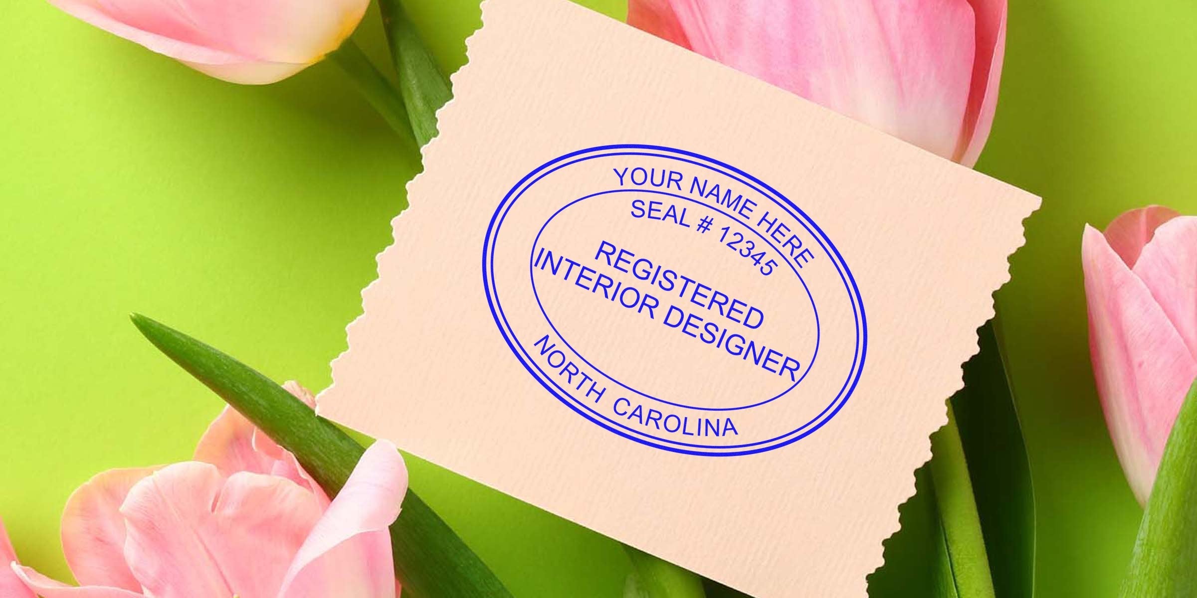 Seal embossing of a registered North Carolina interior designer on paper, with pink tulips against a green backdrop.