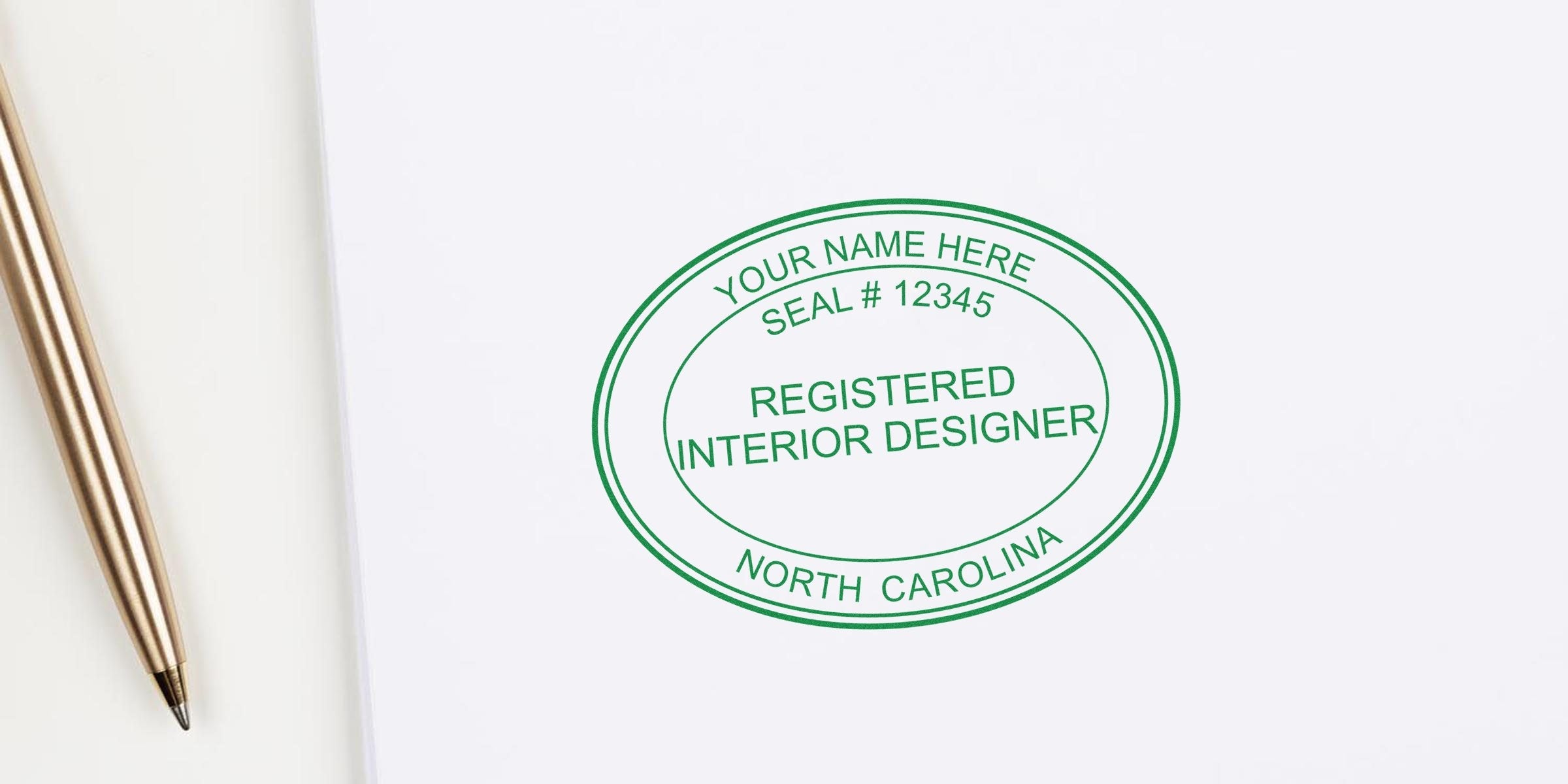 North Carolina interior designer seal stamped with a gold pen on white paper, showing a seal stamping guide.