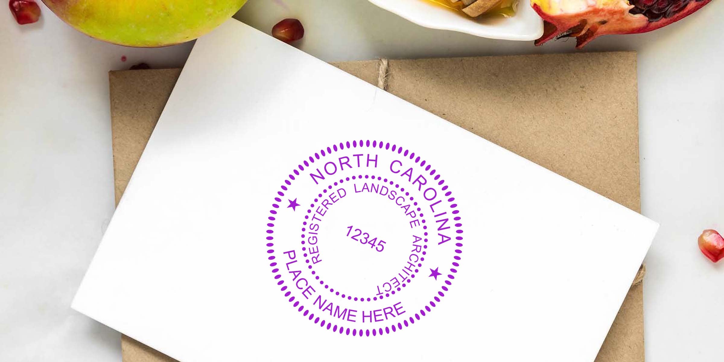 North Carolina landscape architect stamp on white envelope with natural decor, emphasizing licensing requirements.
