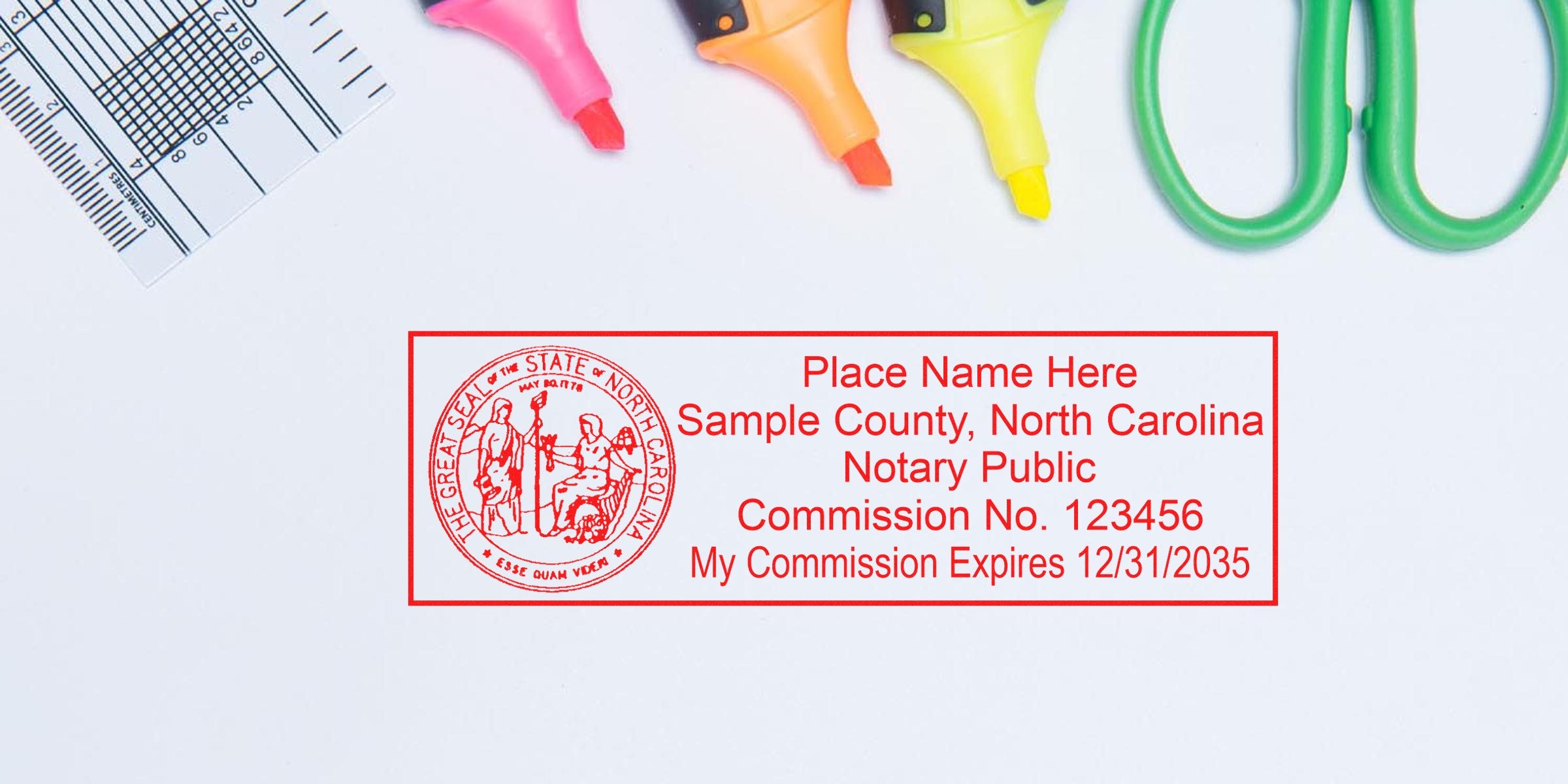 Red North Carolina notary seal with commission details, surrounded by office supplies like highlighters, scissors, and ruler on white background, showcasing NC notary seals and seal deals.
