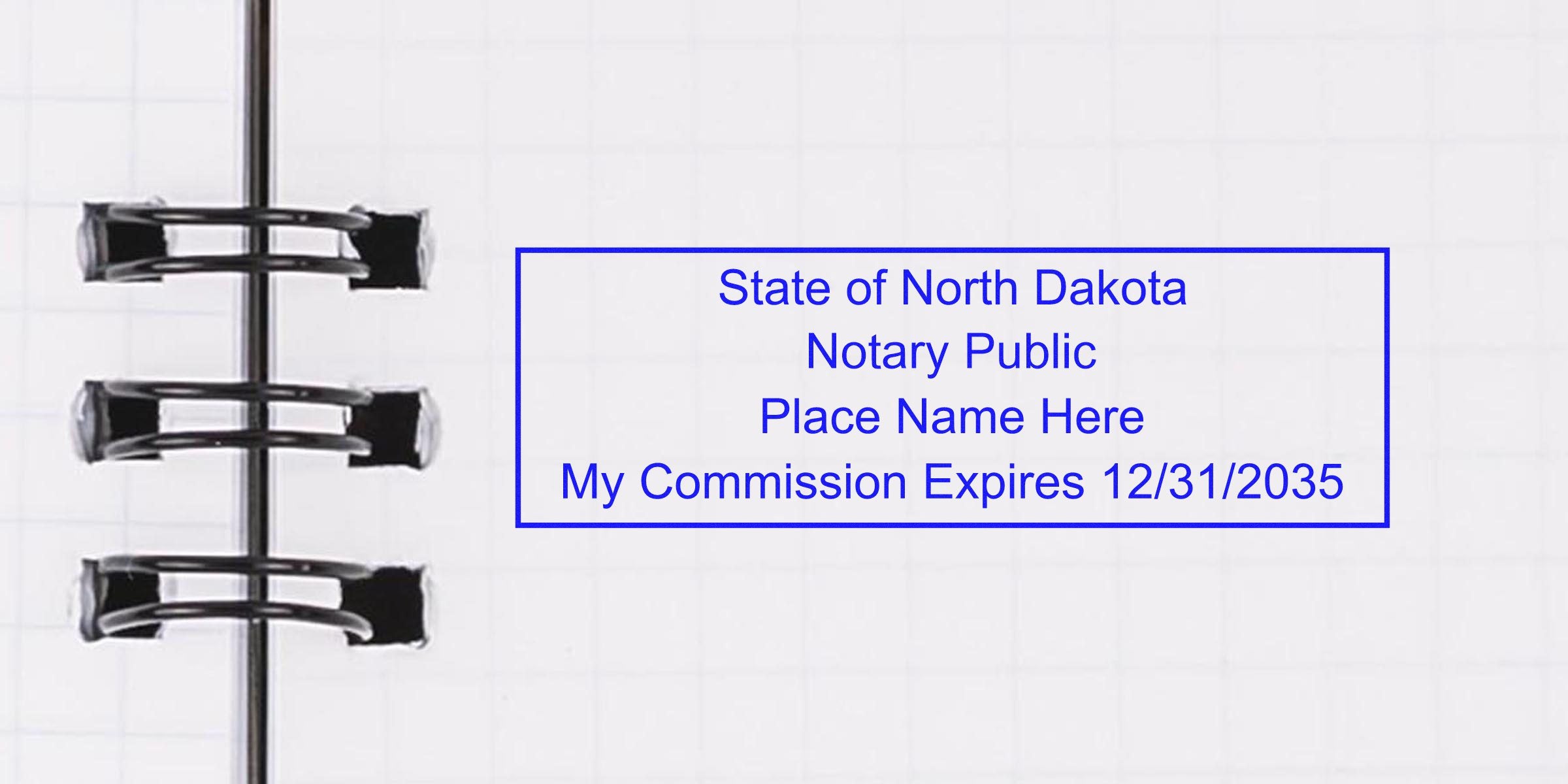 North Dakota notary stamp on notebook page showing commission expiration date, emphasizing the option to purchase a notary stamp online.
