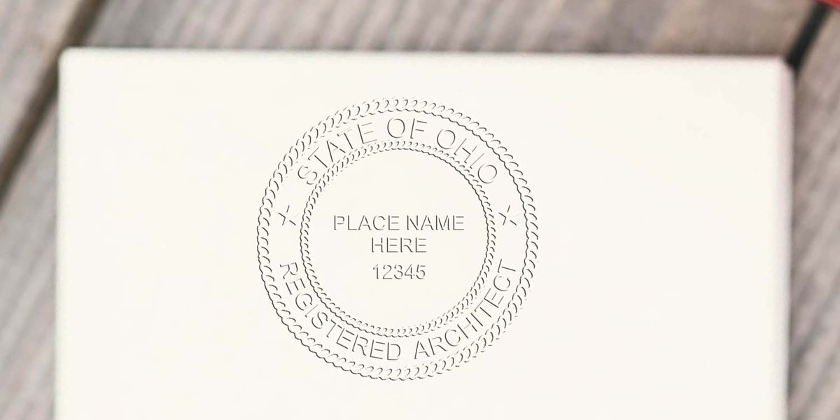 Ohio architect embossed seal on white paper, perfect for professional certification and architect stamp orders.