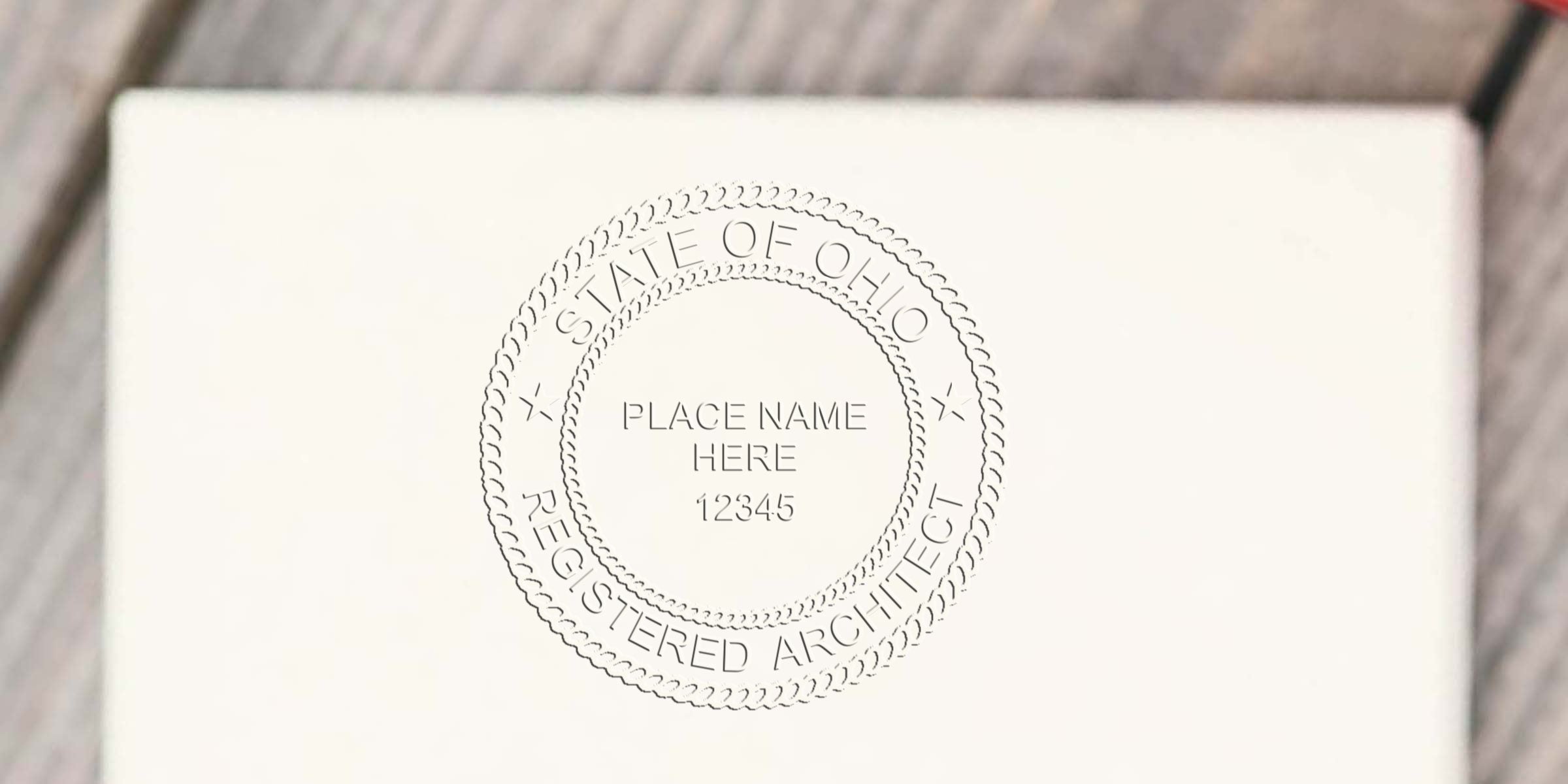 Ohio architect seal stamp on white paper, showing Ohio embossing seals and digital architectural seals for professional certification.