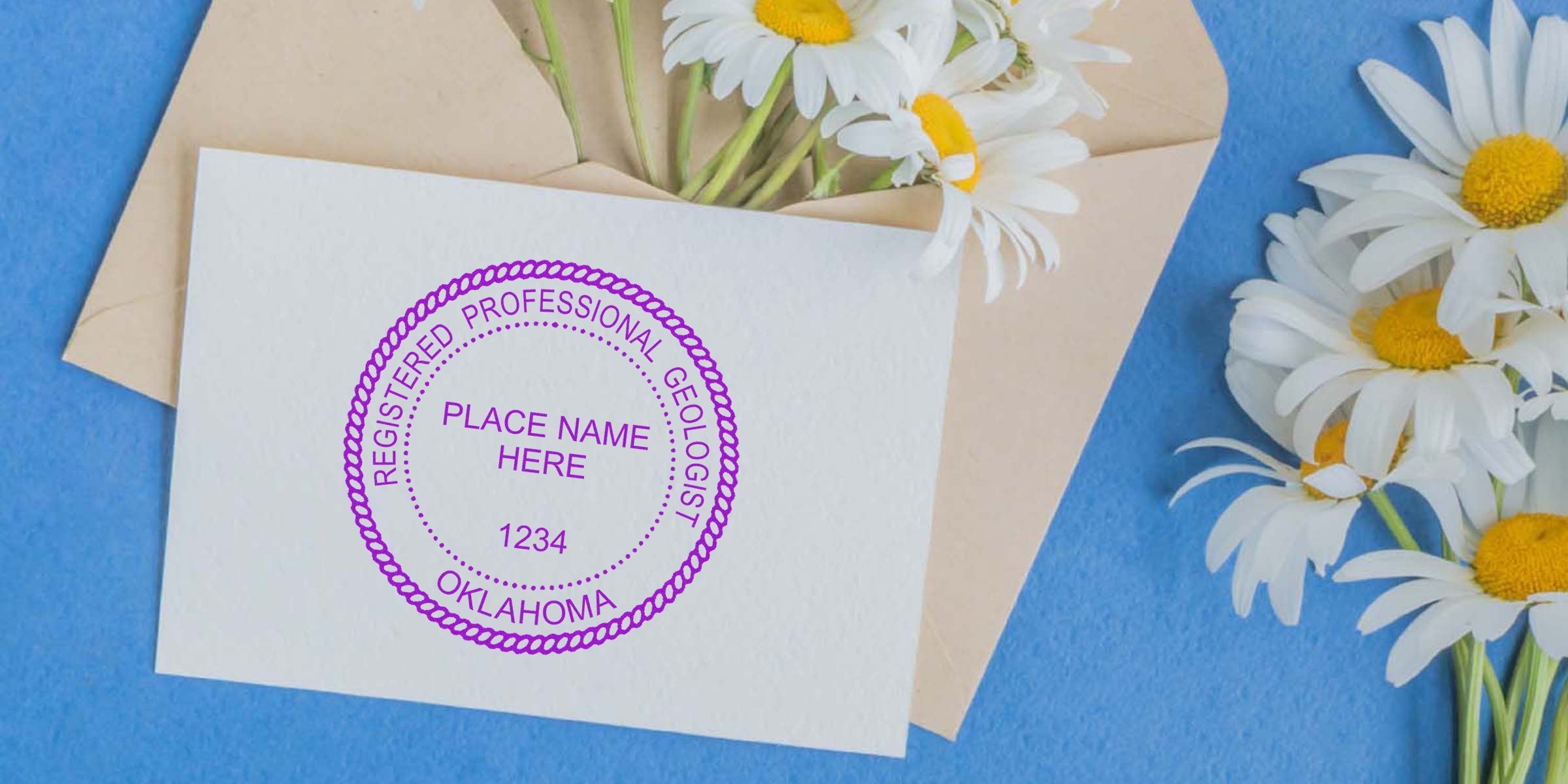 Custom Oklahoma geologist stamp with registered professional seal on white card, daisies, and envelope on blue background, showcasing the advantages of a geologist stamp.