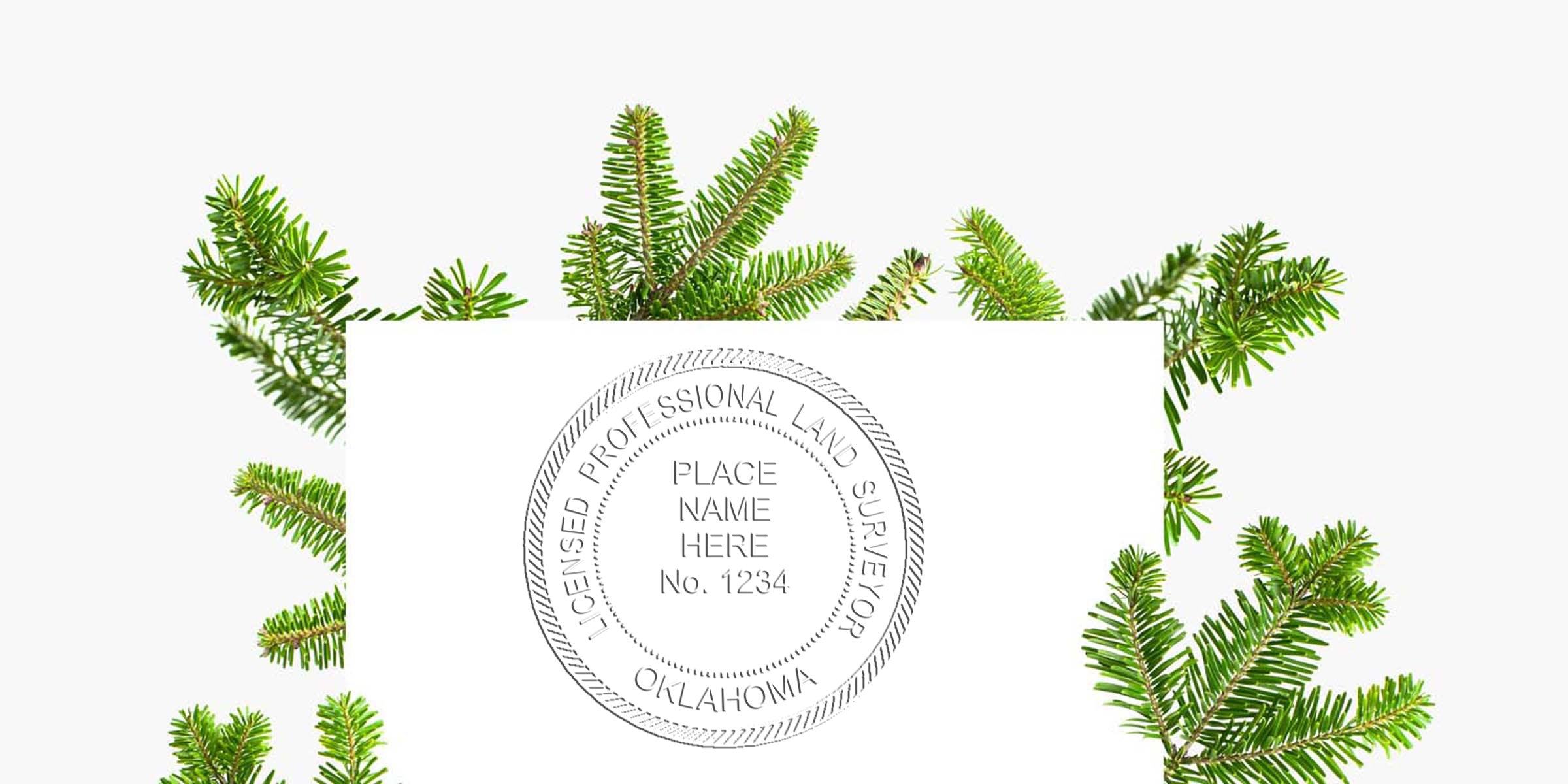 Licensed Oklahoma land surveyor stamp with green pine branch background and seal embosser tips.