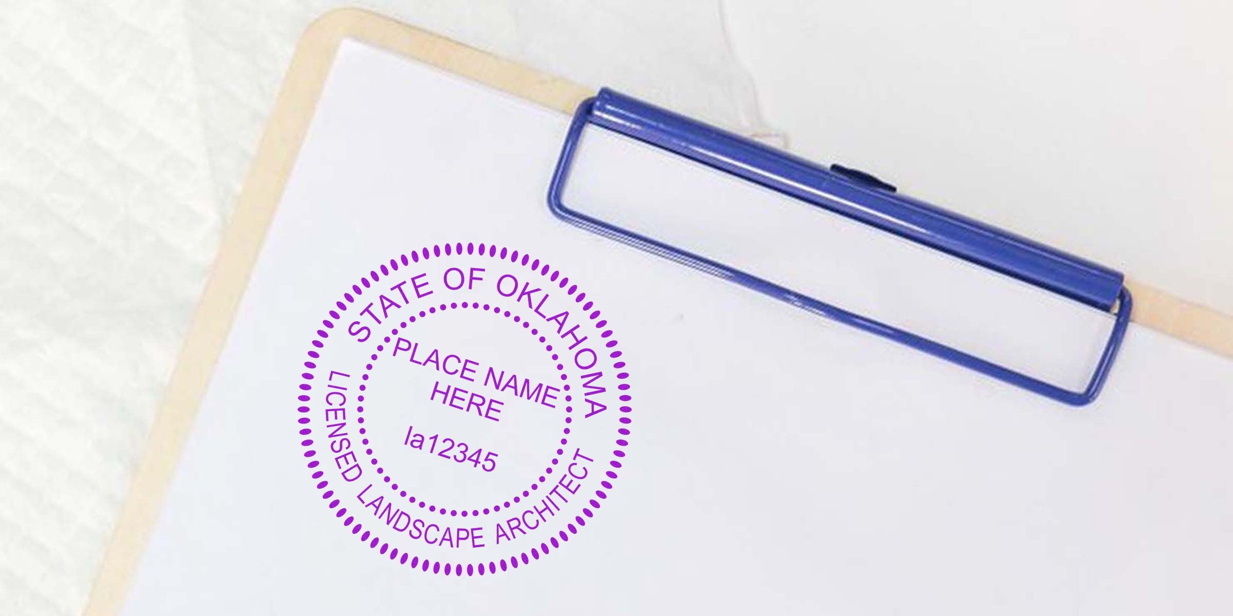 Oklahoma landscape architect stamp on clipboard for professional licensing and certification.