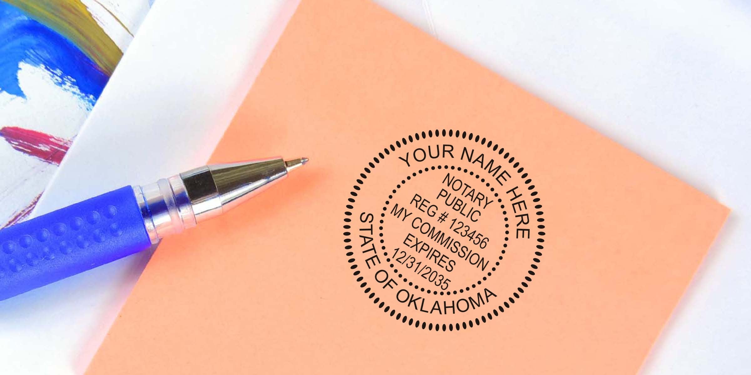 OK Notary Seal stamped on orange paper with blue pen, emphasizing the importance of the Notary Seal for Oklahoma notary services.
