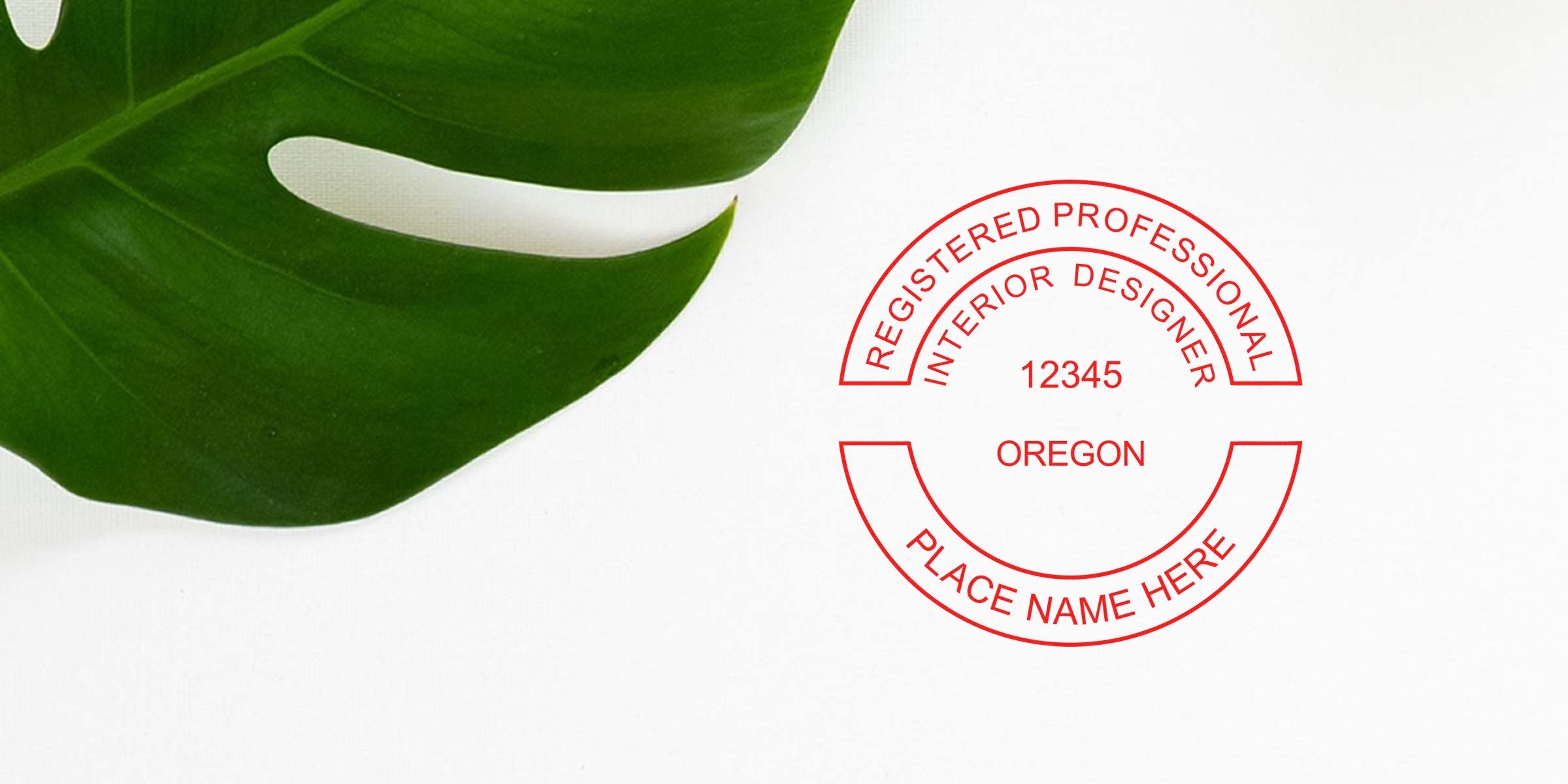 Oregon interior designer license stamp with green leaf, meeting all interior designer stamp requirements on a white background.