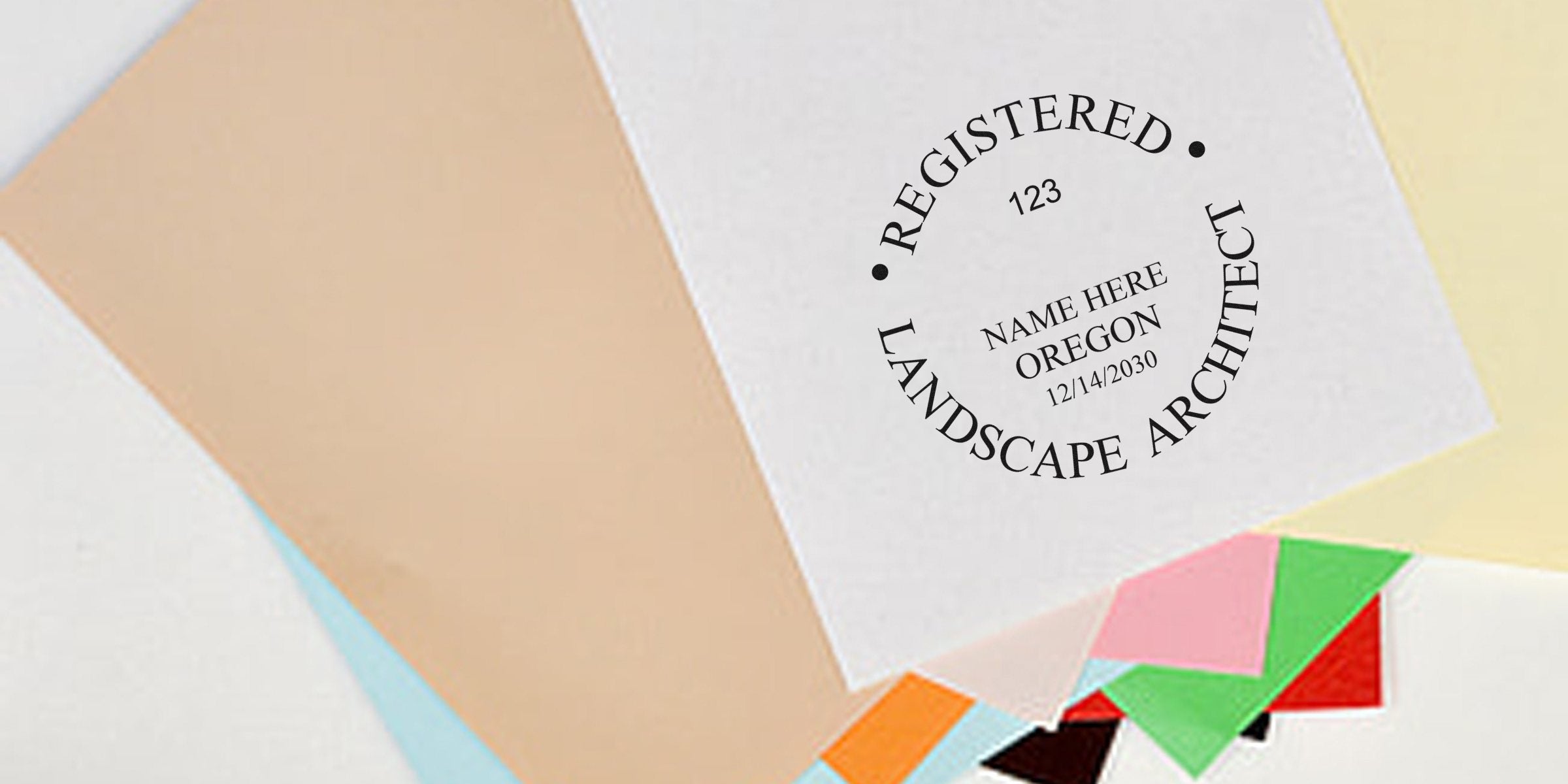 Oregon landscape architect registered stamp on colorful paper samples showcasing seal products for professional certification.