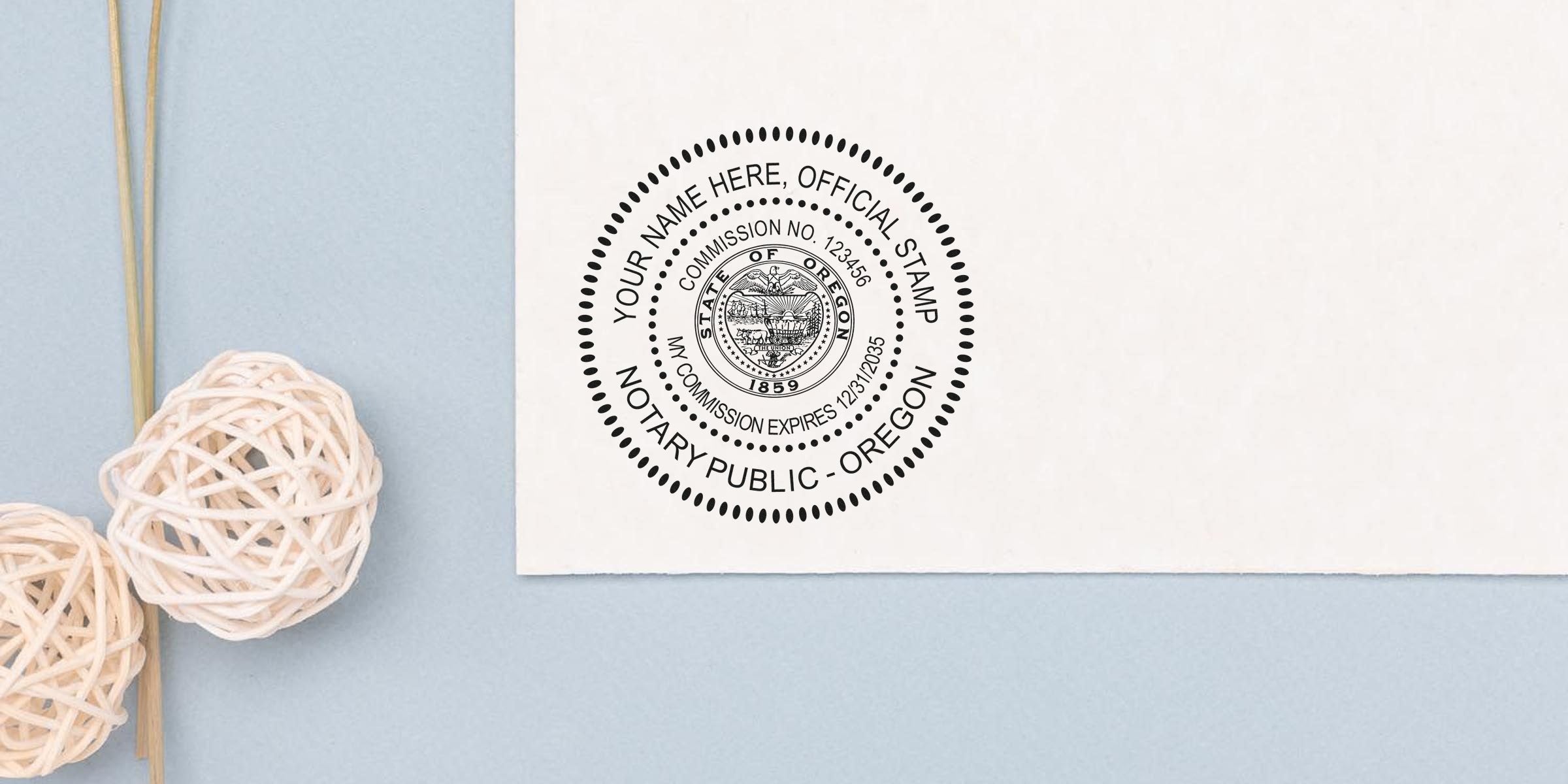 Oregon notary public stamp on white paper with decorative wicker balls on a blue background, showcasing essential Oregon notary supplies and a checklist.