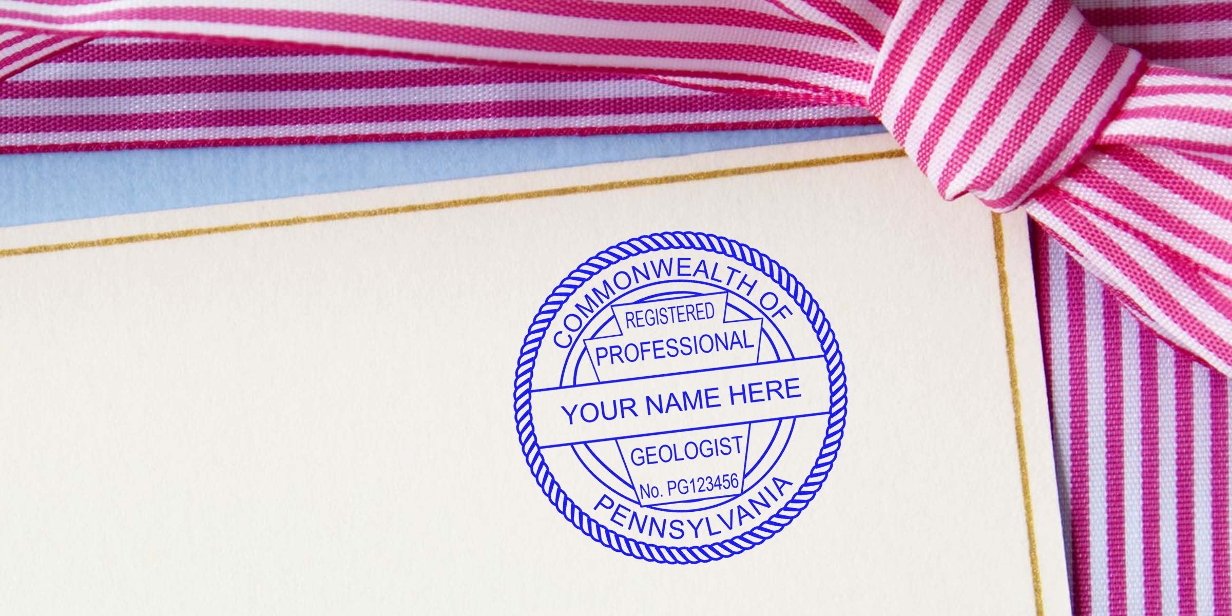 Pennsylvania Geologist Stamp on certificate with pink striped ribbon, fulfilling Geologist Stamp requirements.