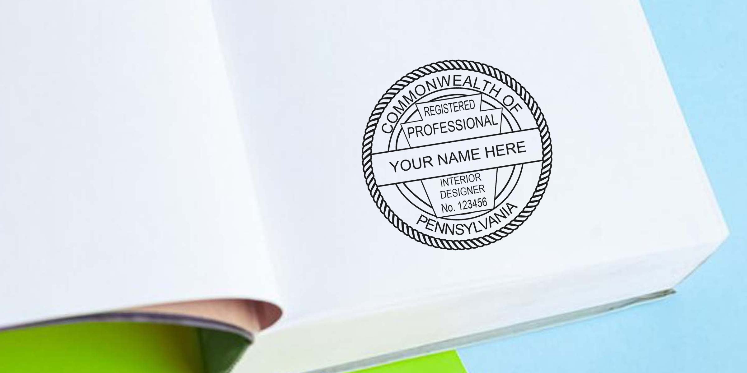 Custom Pennsylvania interior designer stamp on white paper, featuring a professional seal that meets interior design stamp size standards.