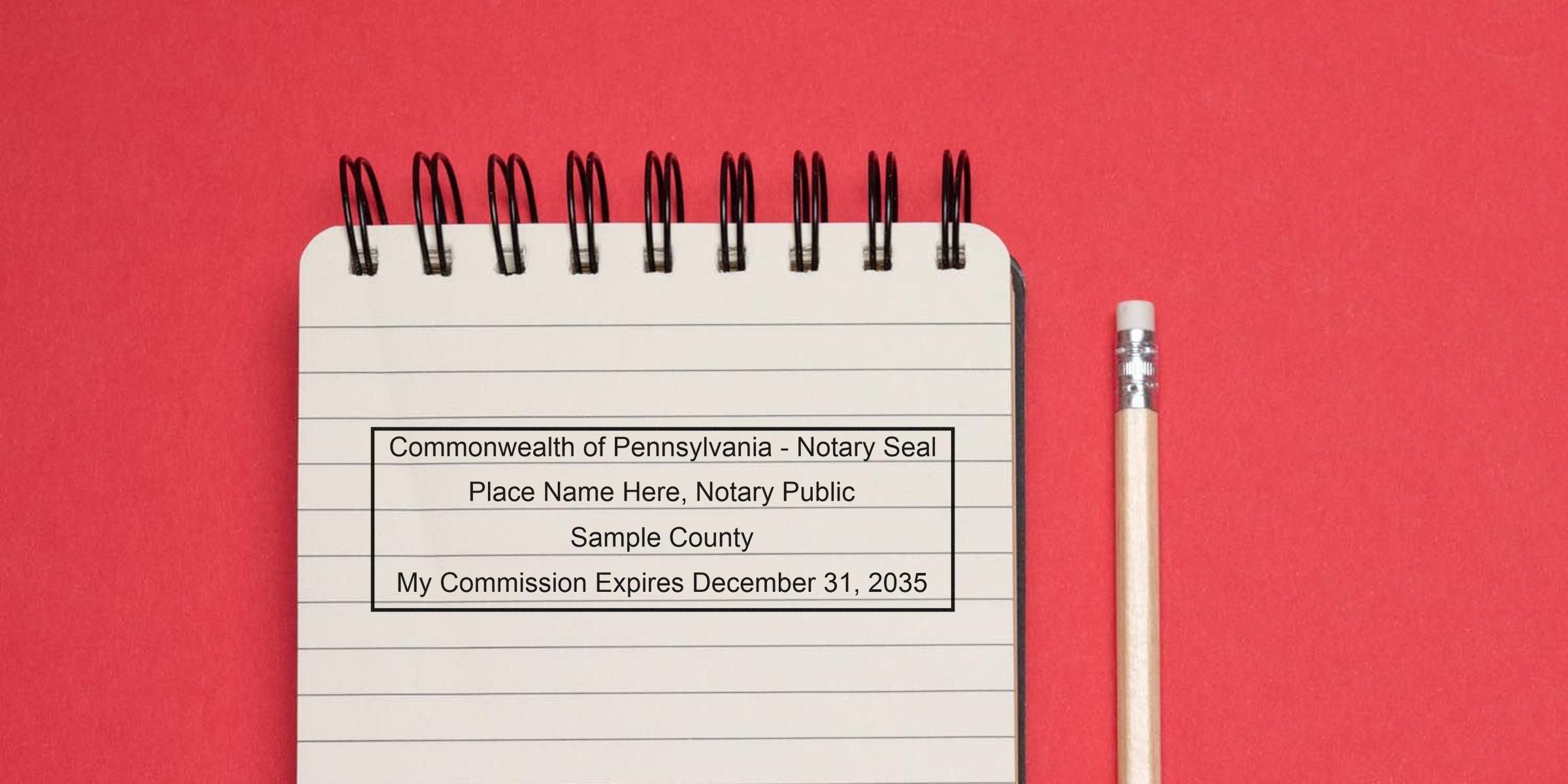 Pennsylvania notary seal sample on lined notebook with pencil, showing commission expiration date; buy notary seal online.