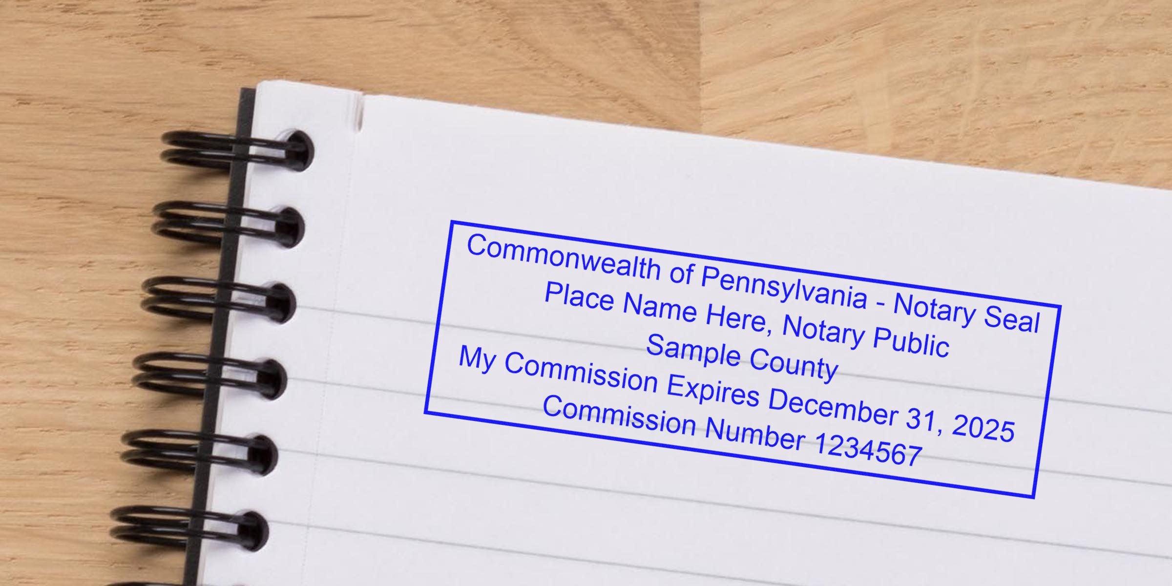 PA notary seal on notebook paper showing commission expiration and certification, with tips for buying a notary seal.