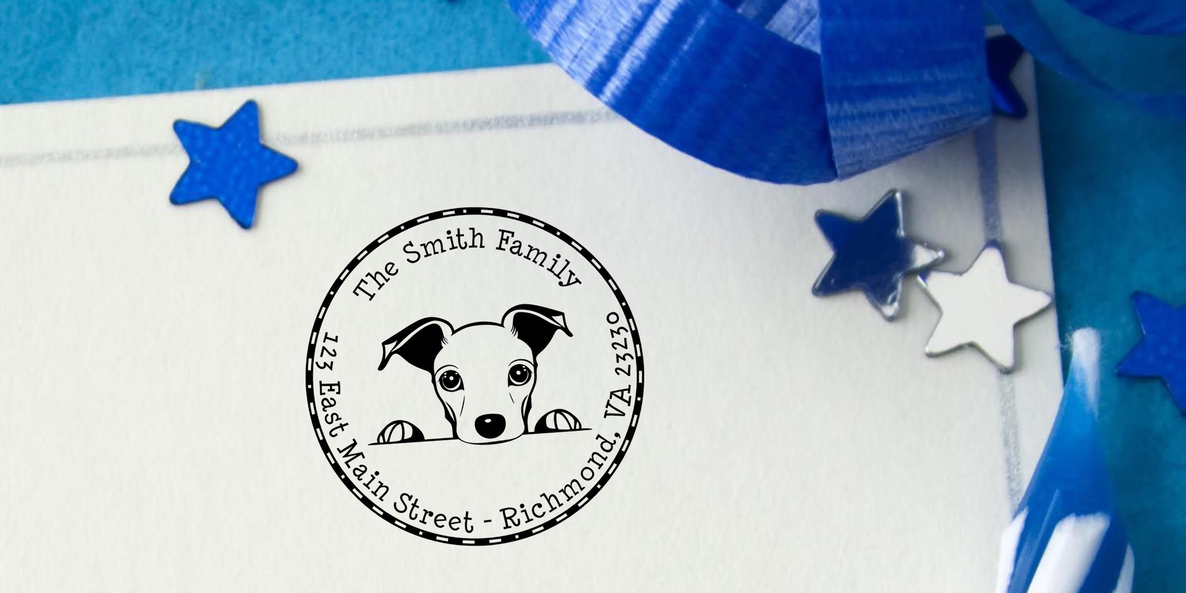 Custom dog family address stamp with “The Smith Family,” Richmond, VA address, and blue patriotic star decorations on a white card