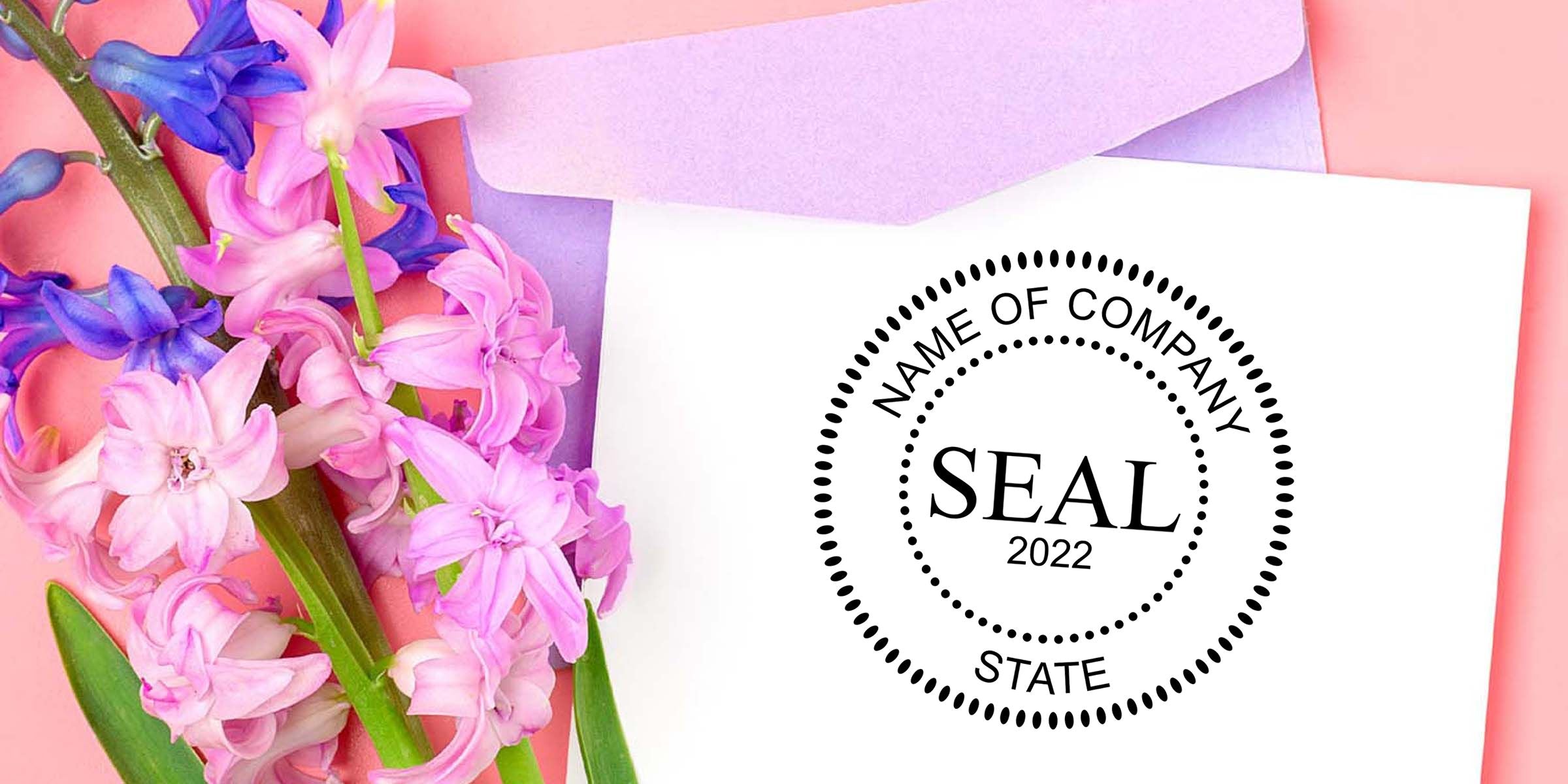 Pink and purple hyacinth flowers beside a white envelope with a “Name of Company Seal 2022 State” logo on a pastel pink background