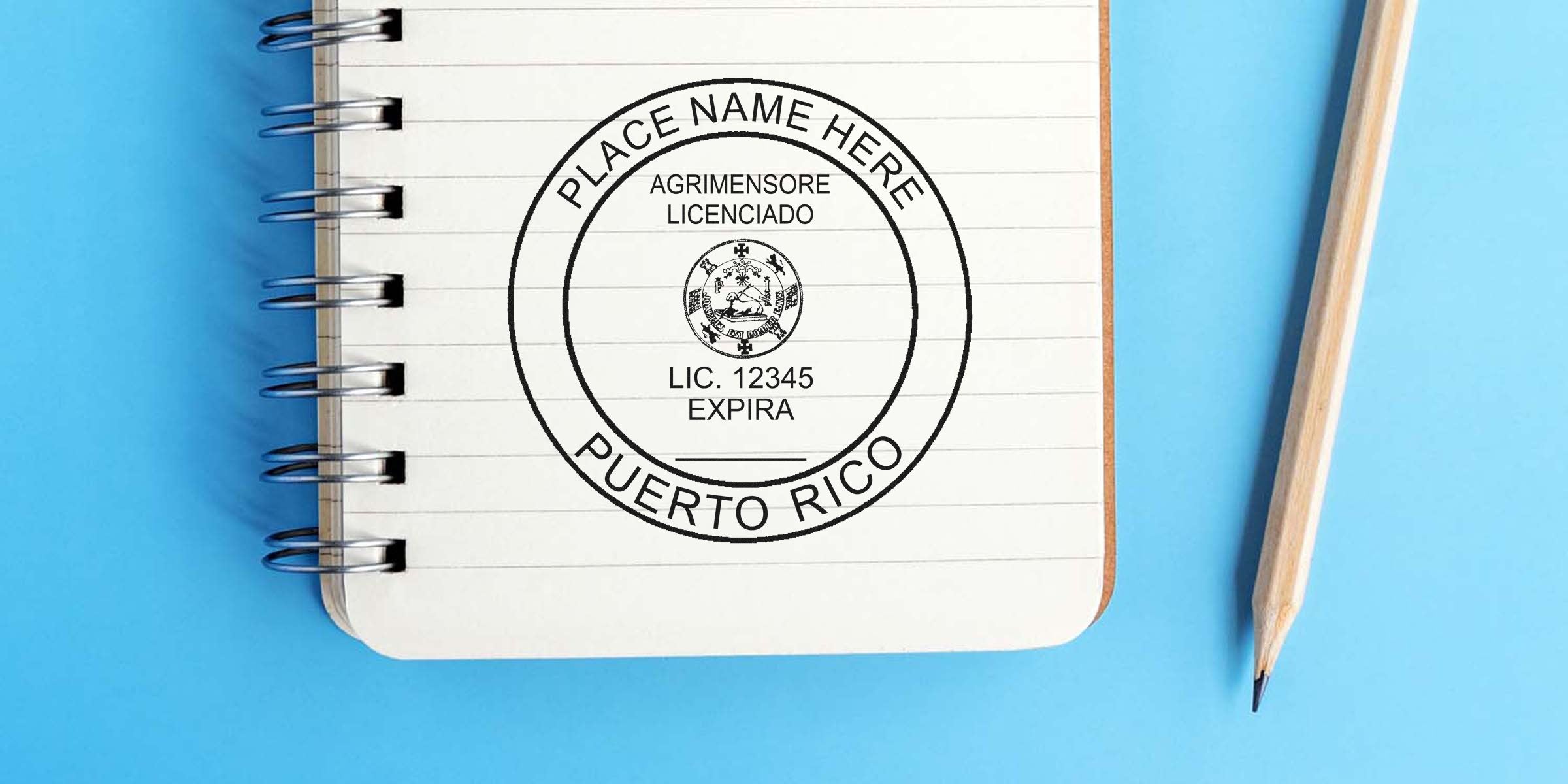 Puerto Rico land surveyor stamp on notebook with pencil, set against a blue background, highlighting online land surveyor certification.