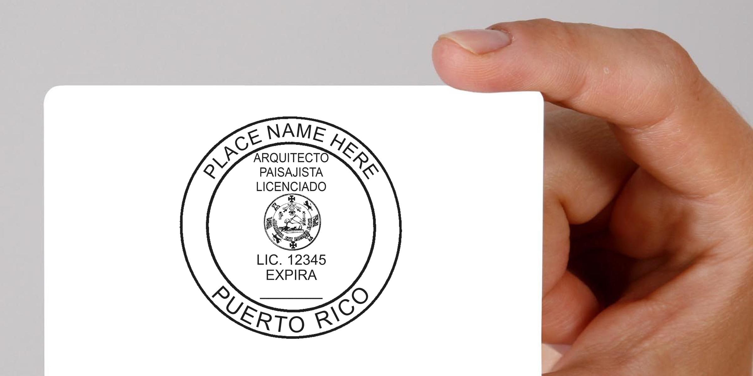 Hand holding a white card with a Puerto Rico landscape architect stamp; purchase Puerto Rico architect stamp.