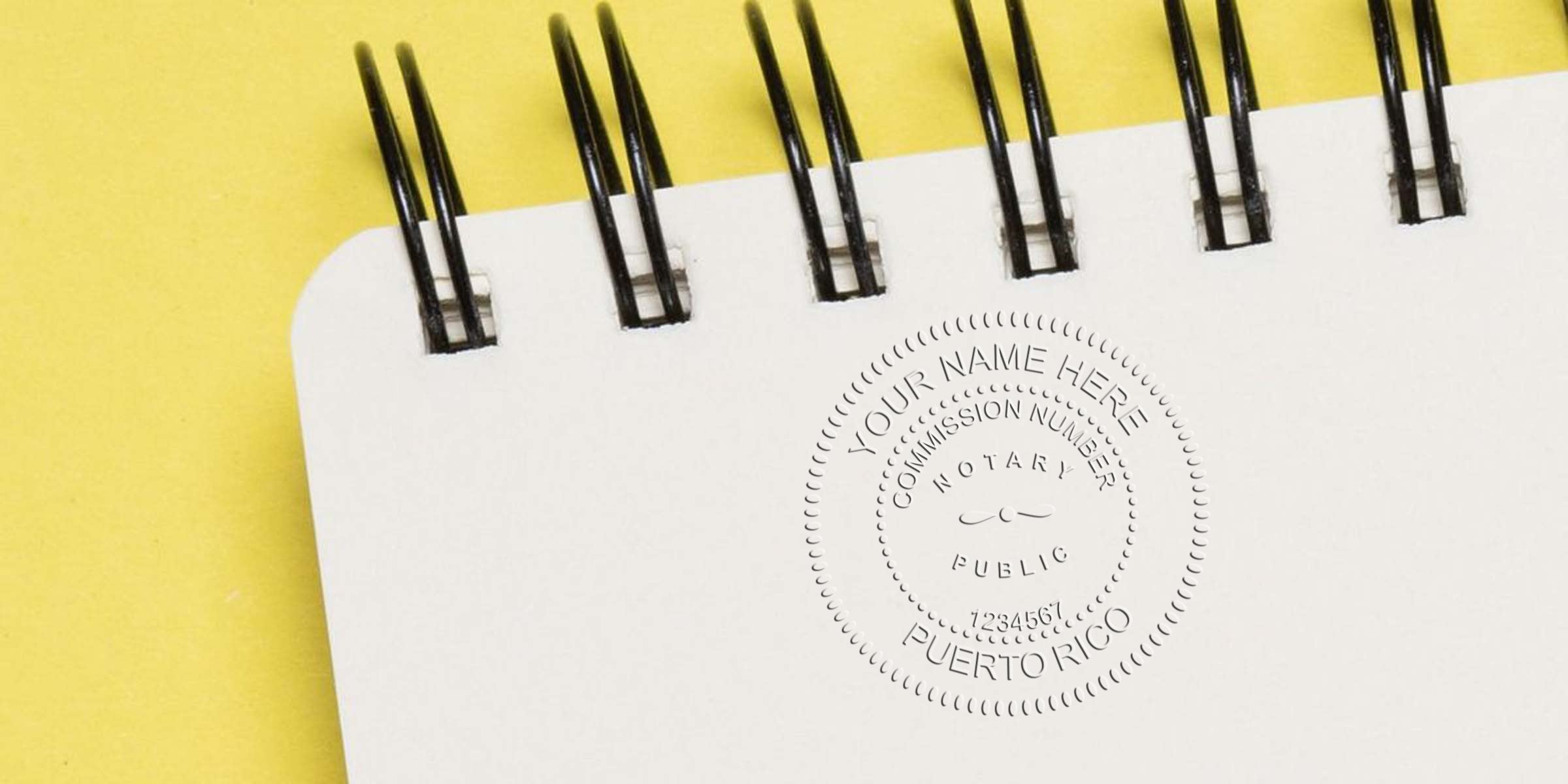 PR notary seals embossed on a white spiral notebook with a yellow background, featuring a top notary seal option with a Puerto Rico commission number.