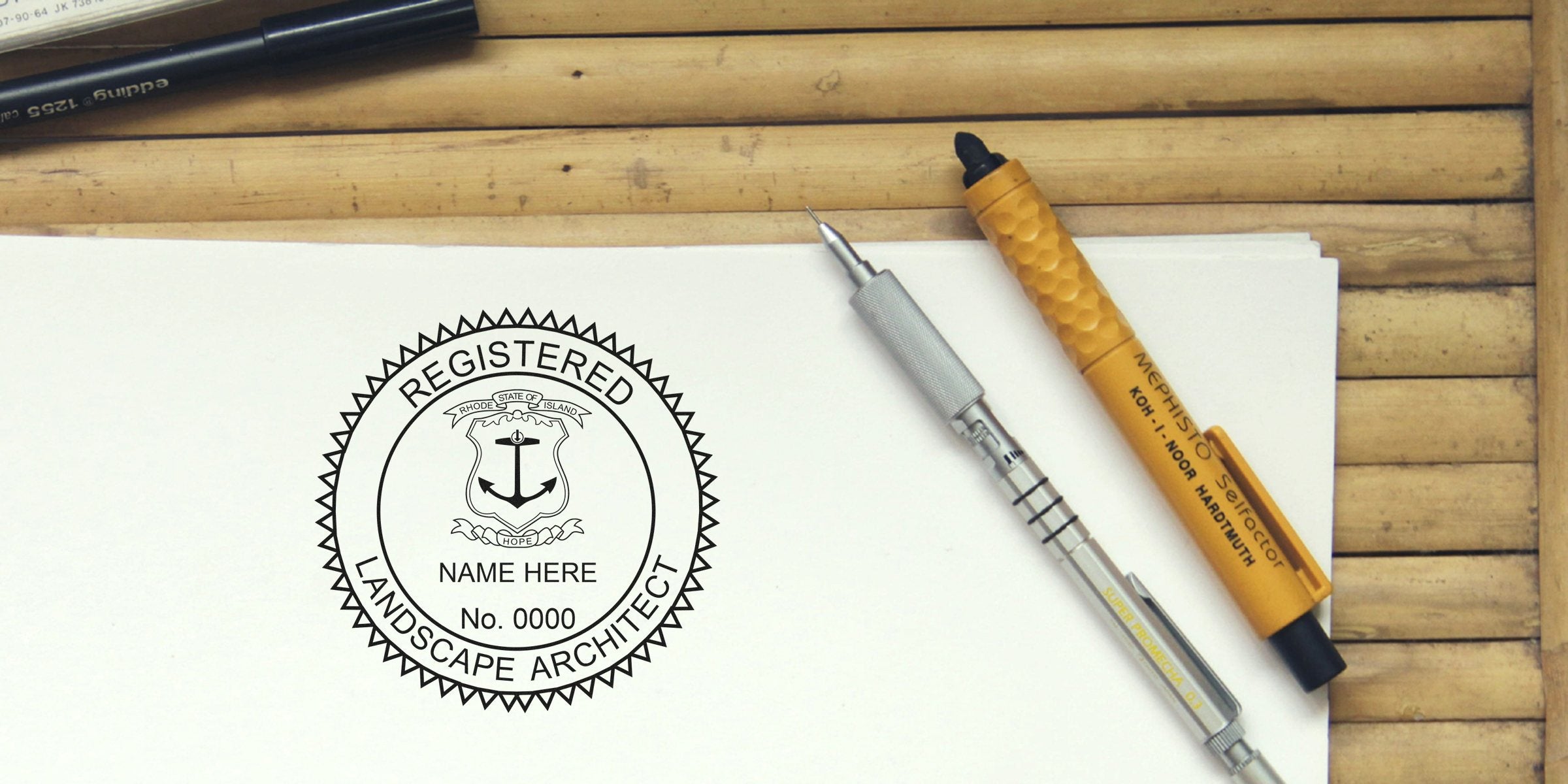 Rhode Island landscape architect stamp on paper with drafting pens on wooden table, showcasing stamp requirements for landscape architects in Rhode Island.