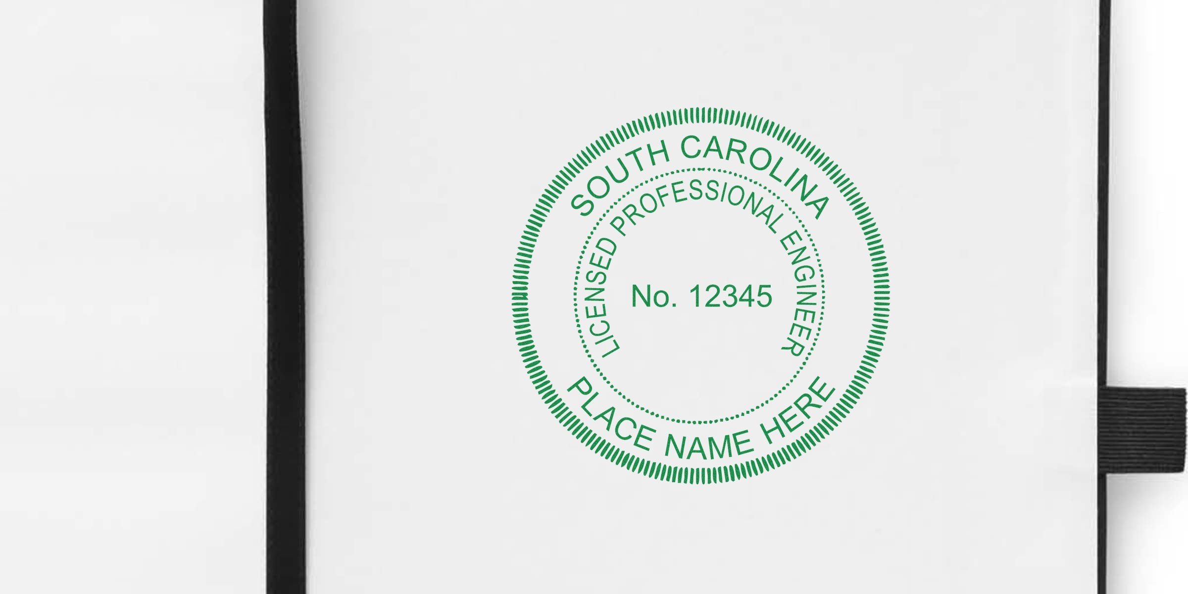 South Carolina Custom Engineer Seal and Professional Engineer Stamp with license number on white notebook background.