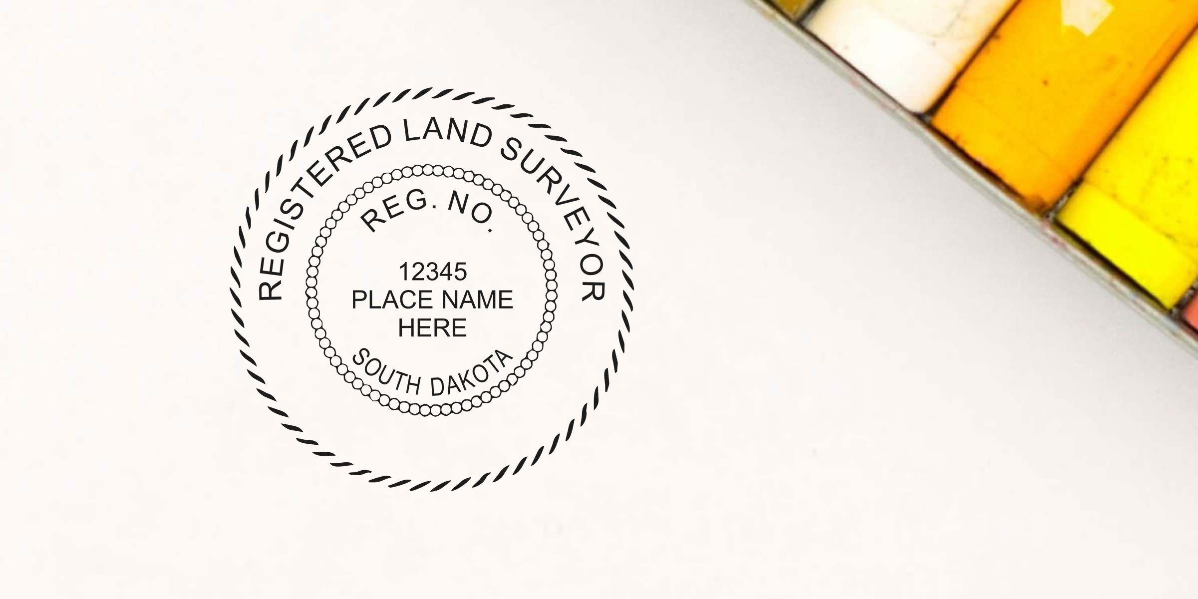 South Dakota land surveyor stamp made with pastel chalks, showing a size guide for the stamp.