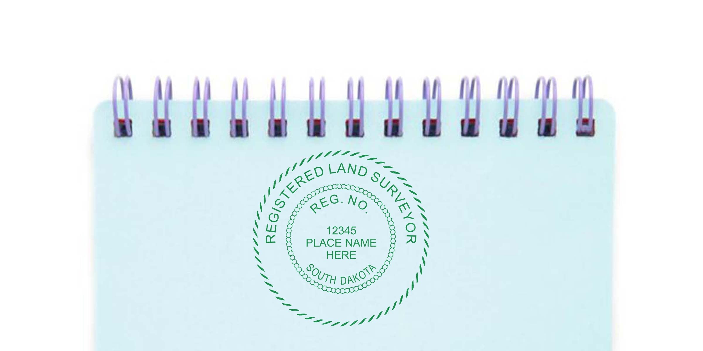 South Dakota land surveyor stamp on spiral notebook, showing official seal, registration mark, and stamp details.