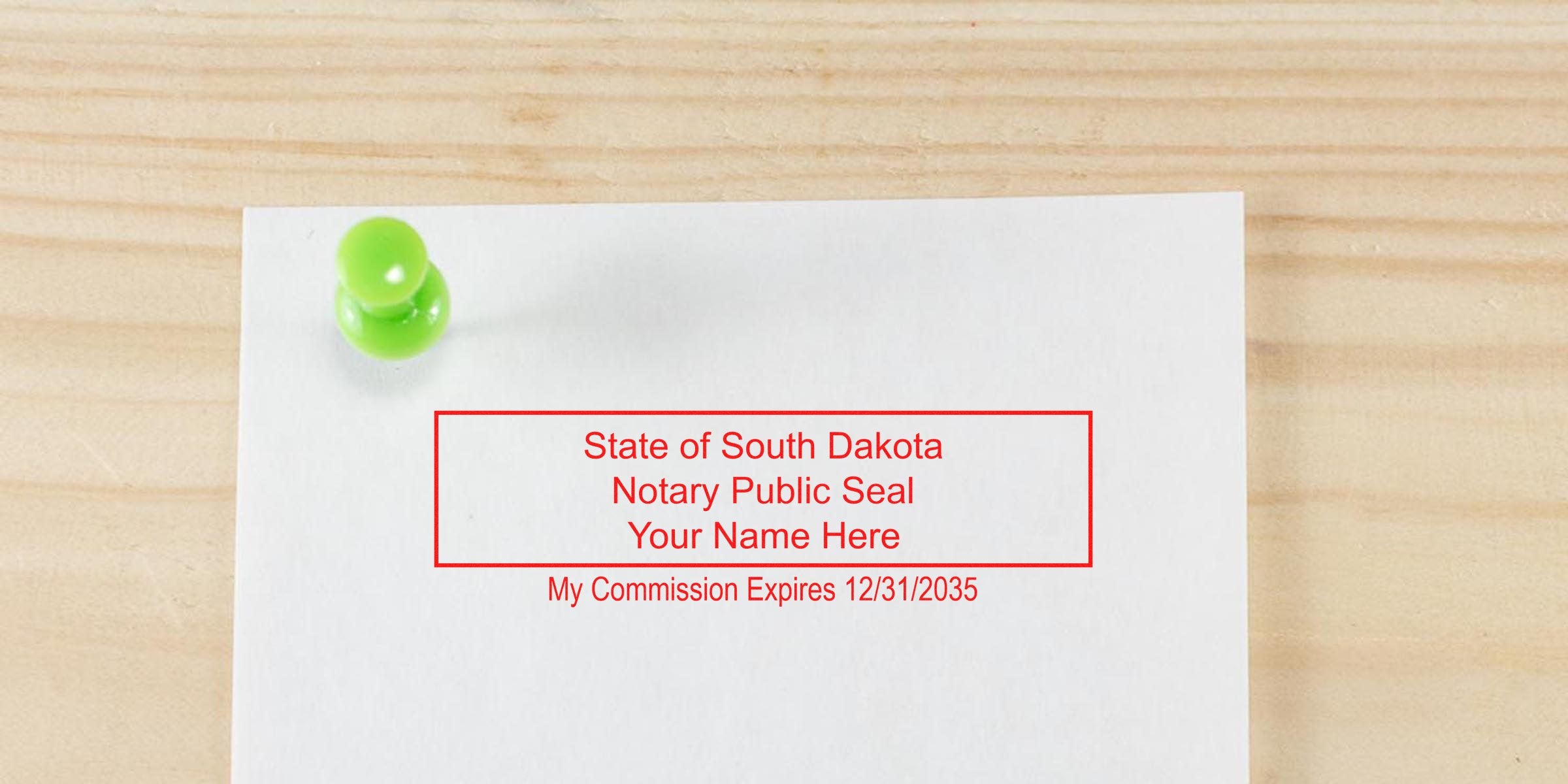 Reliable South Dakota notary seal showing the state seal and commission expiration date pinned on wood, emphasizing the importance of the notary seal in South Dakota.