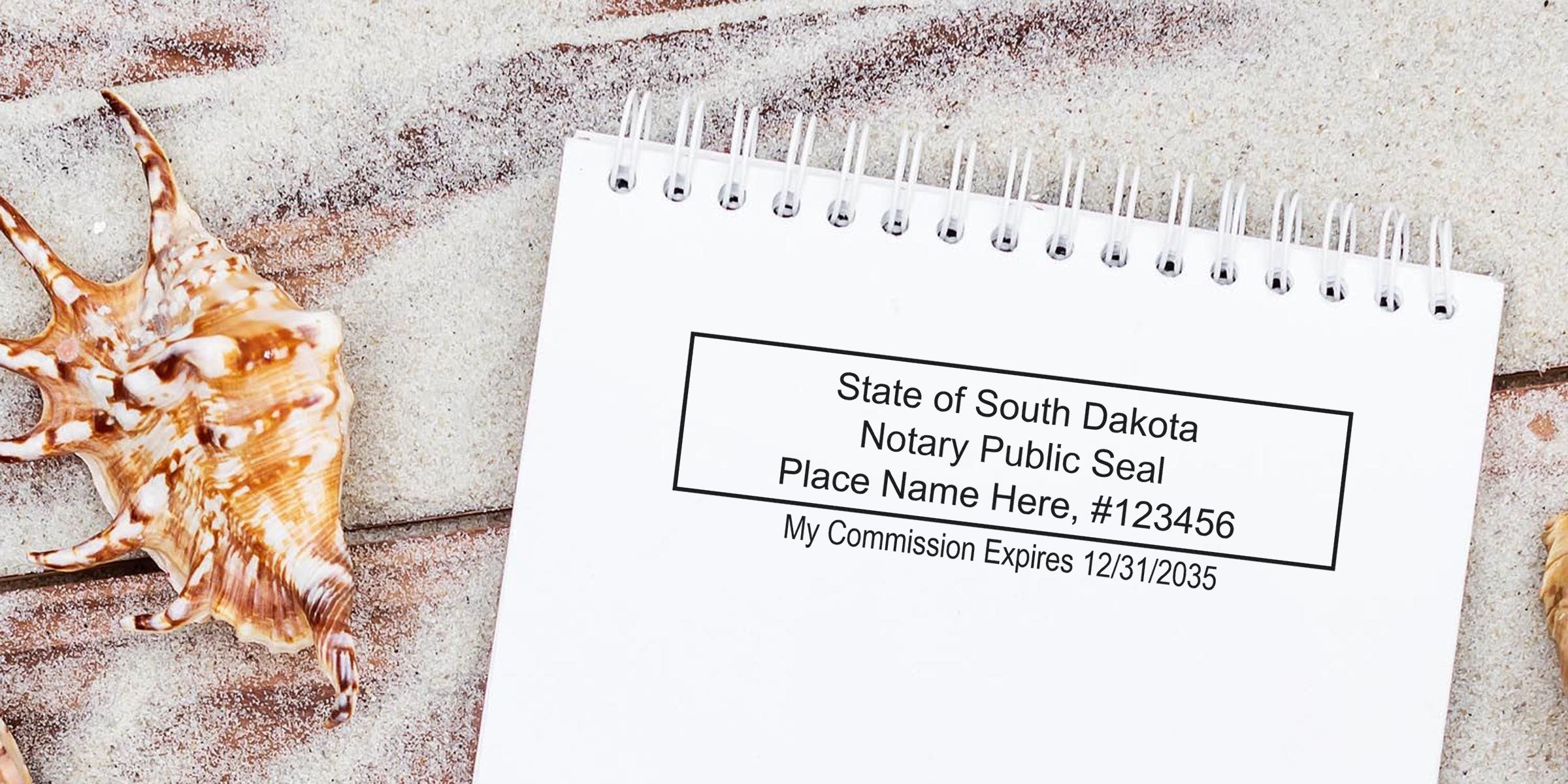 South Dakota notary seal on white notepad with seashells on sandy beach, illustrating a notary stamp guide.