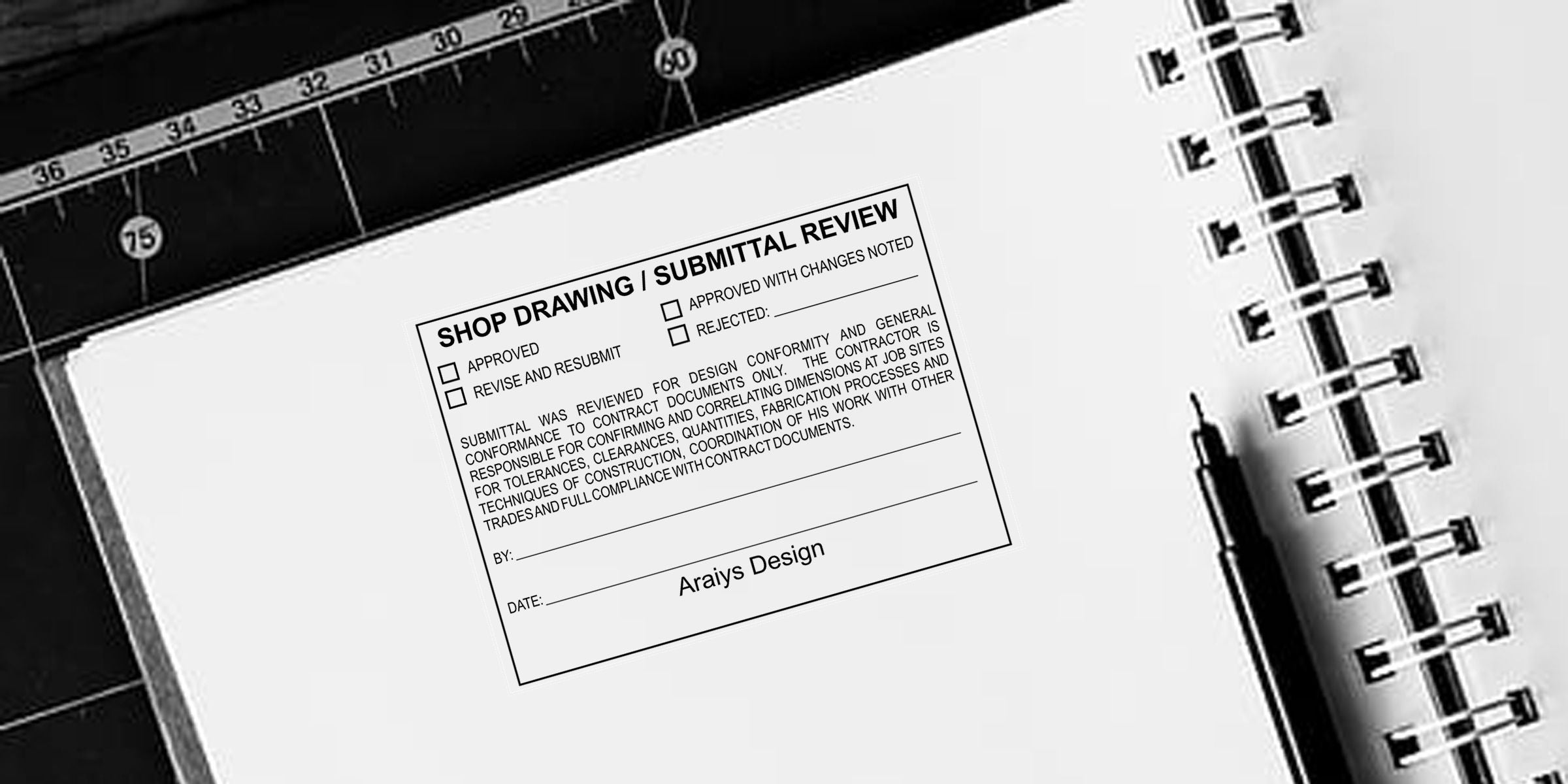 Architectural blueprint notebook with shop drawing submittal review form, spiral binding, and measurement scale for construction document approval.