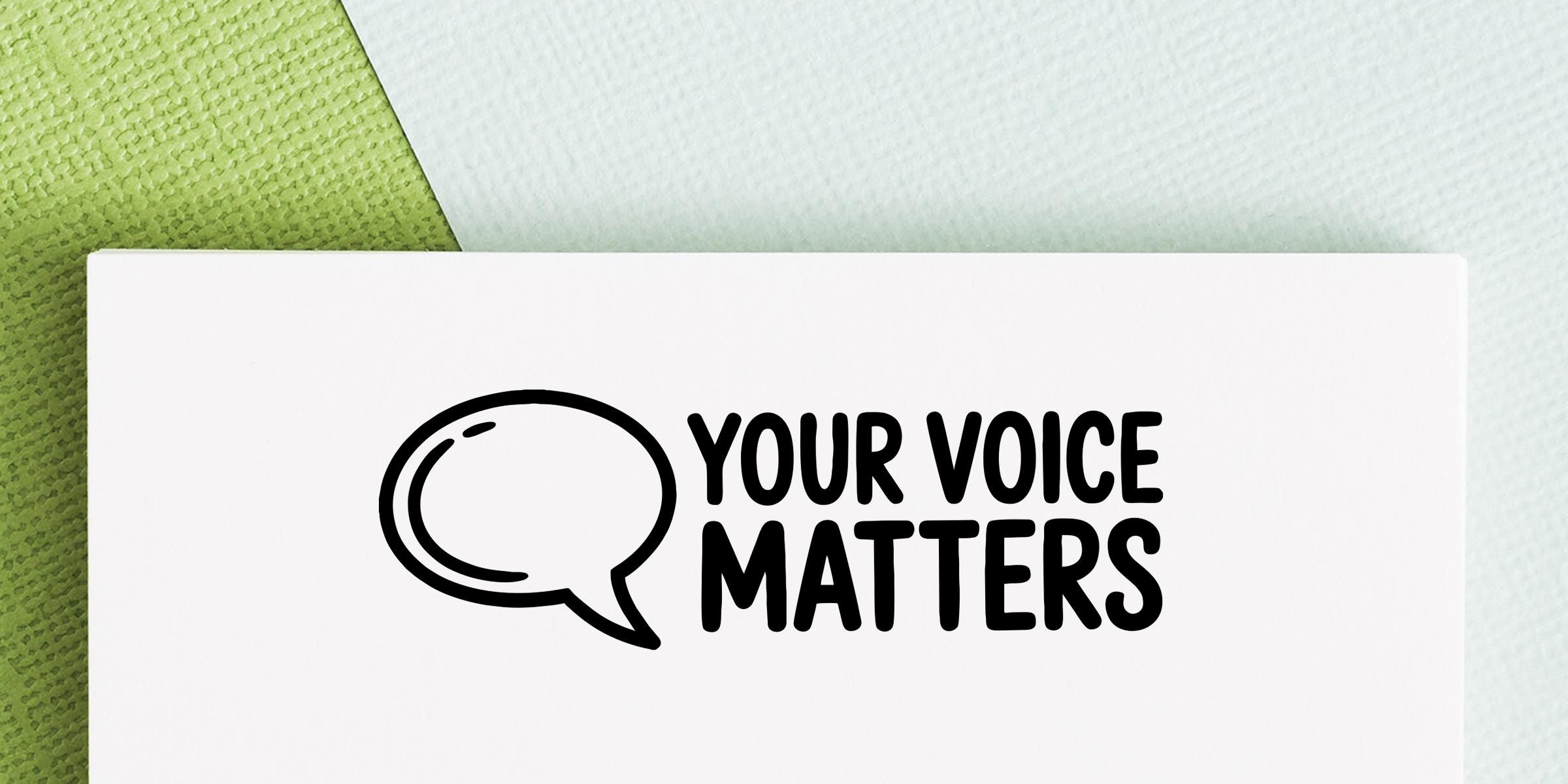 White card with speech bubble icon and bold text “Your Voice Matters” on a green textured background