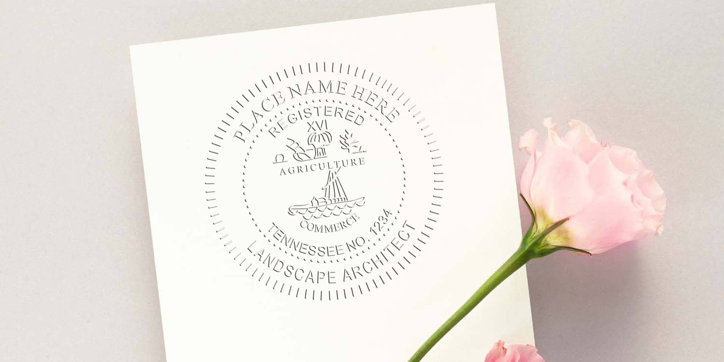 Embossed Tennessee landscape architect stamp on white paper with pink rose, showing professional certification and Tennessee agriculture commerce emblem, reflecting landscape architect regulations in Tennessee.