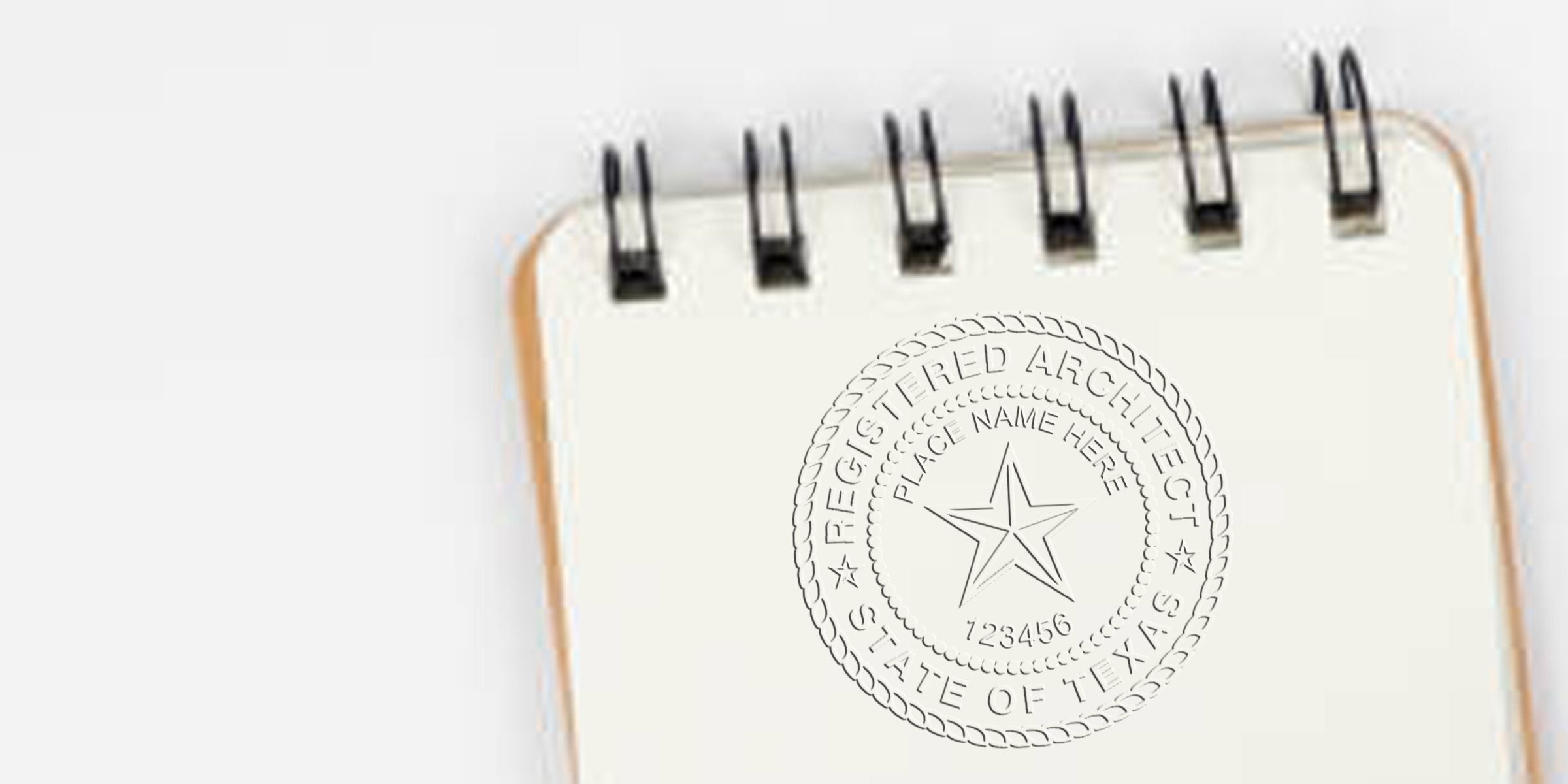 Texas architect stamp on spiral notebook page showing Registered Architect Seal, symbolizing custom architectural services and professional certification.