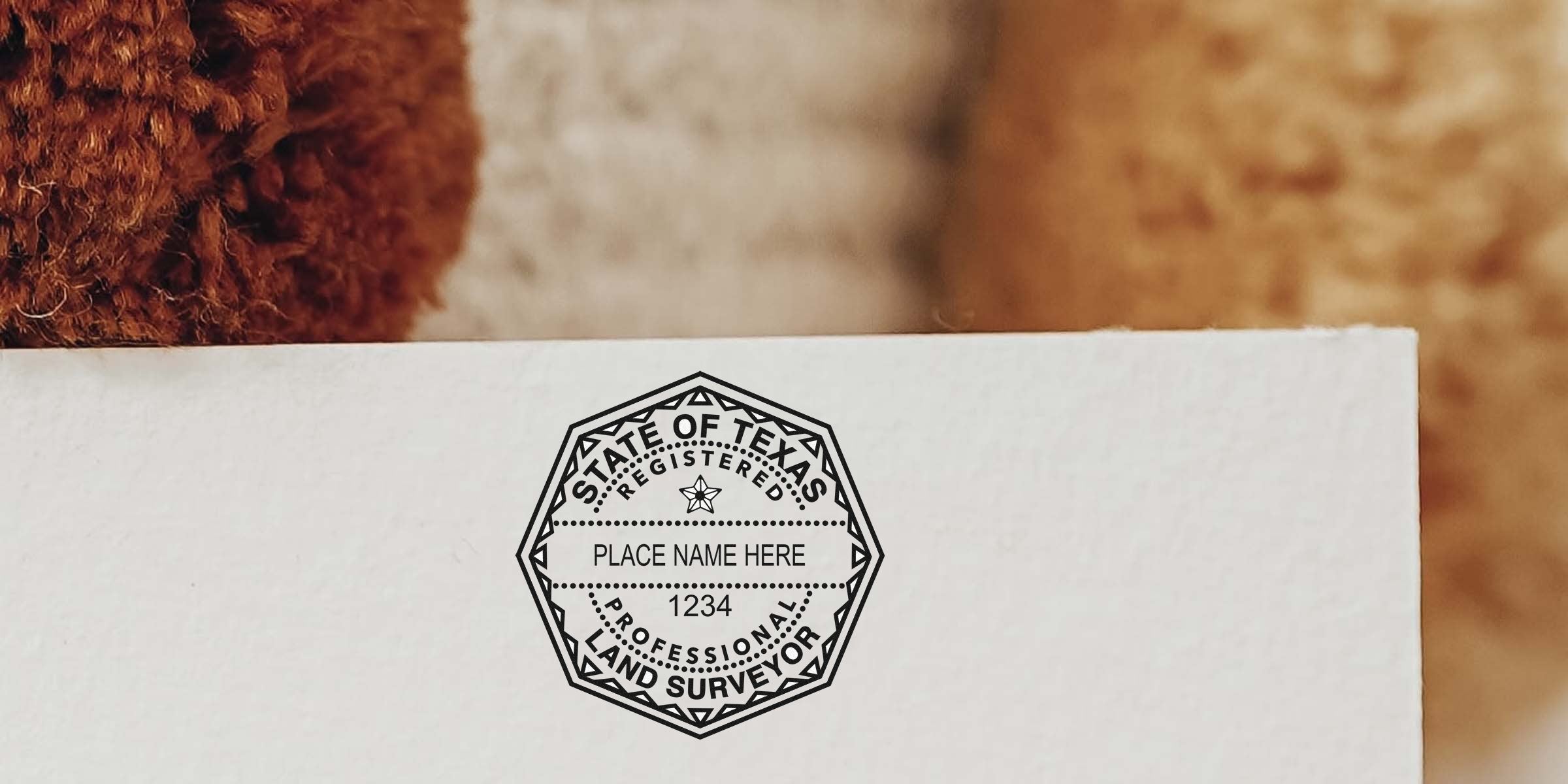Texas land surveyor seal on white paper, symbolizing land surveying services compliant with Texas land surveyor seal laws.