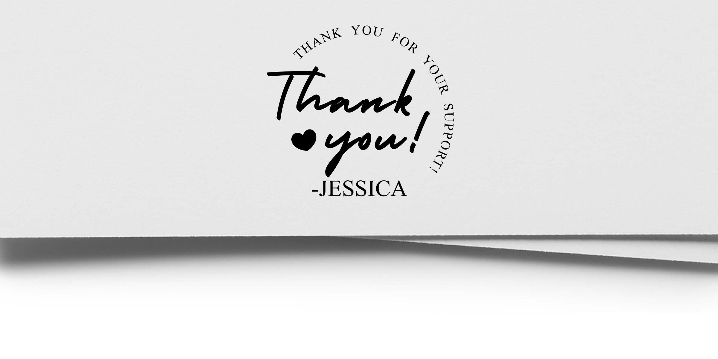 Elegant thank you card design with black handwritten lettering, heart icon, and the message “Thank you for your support, thank you!” signed “-Jessica” on a clean white background.