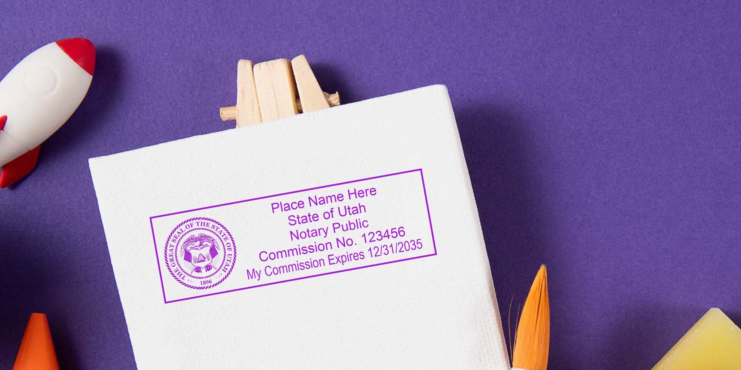 Utah notary seal stamp with commission number and expiration date on white canvas, surrounded by trusted notary tools against a purple background.