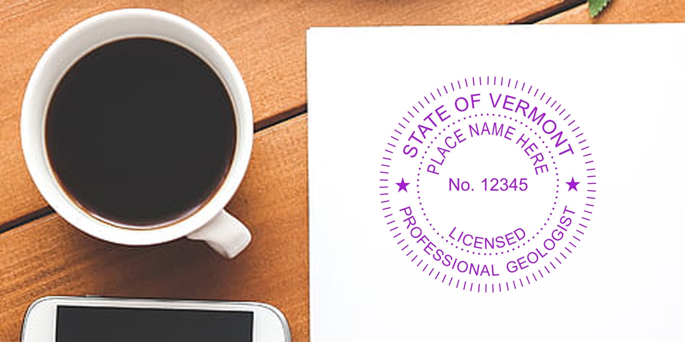 Vermont geologist stamp with license 12345 on white paper next to coffee cup and smartphone on wooden desk, showing a geologist stamp template.