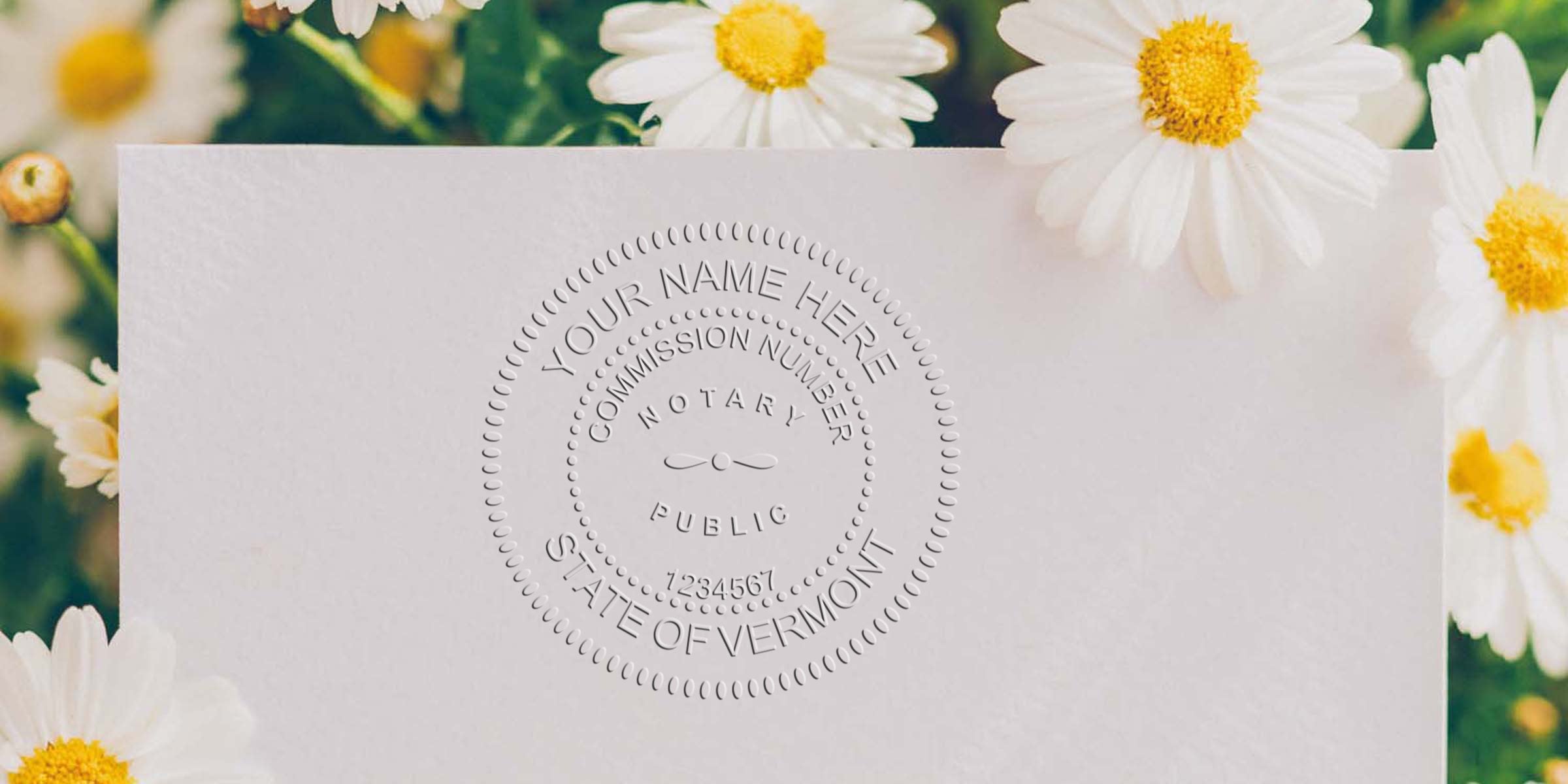 Vermont notary public embossed seal on white paper with daisies, showing Vermont notary stamp law and stamp requirements.