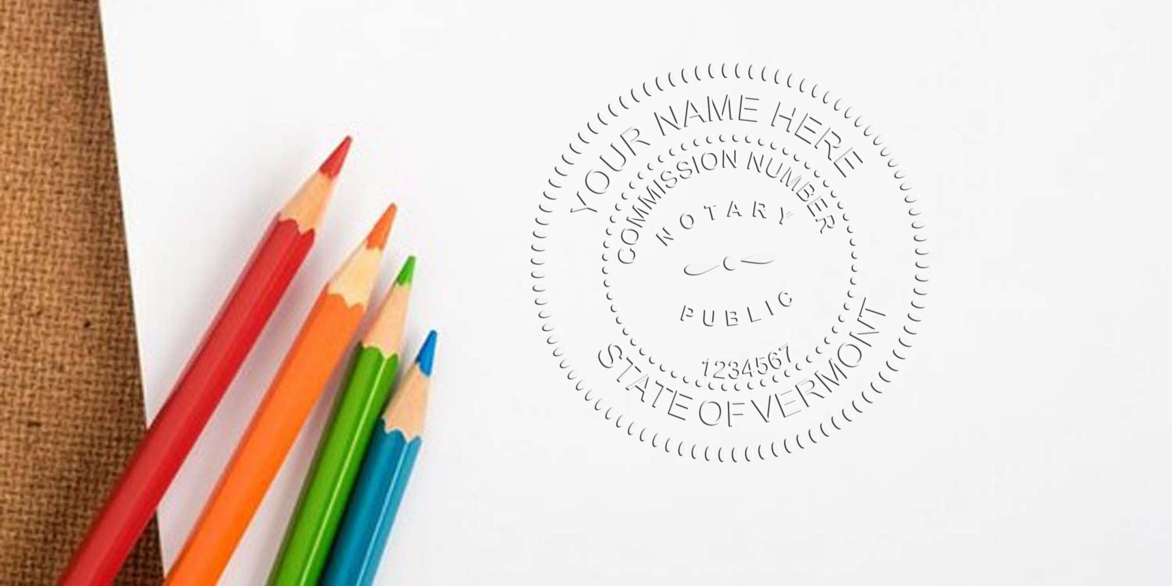 Colored pencils on paper with Vermont notary supplies, highlighting the essential Vermont notary public seal and commission number.