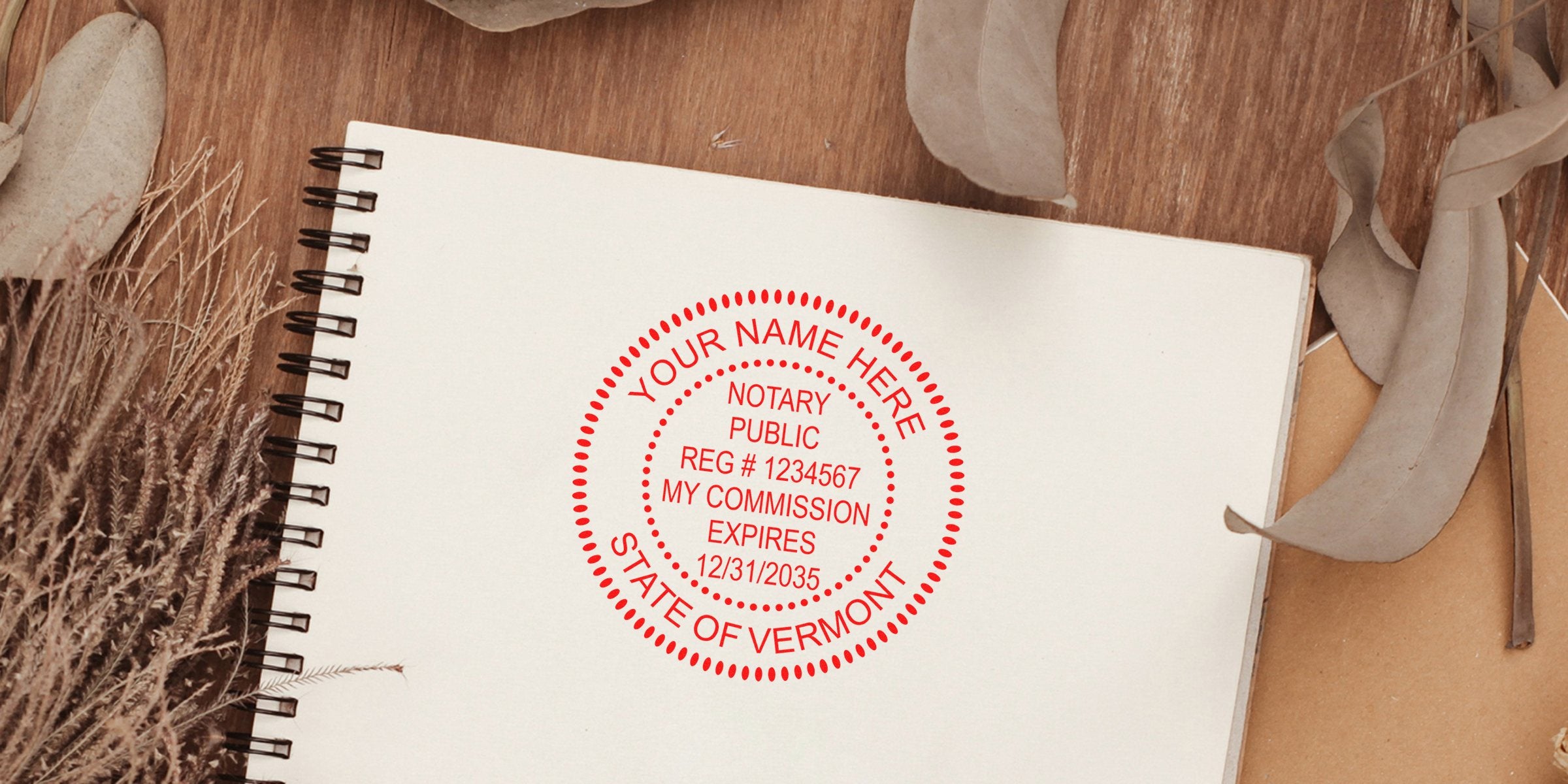 Custom Vermont notary public stamp on notebook with commission expiration date, included in Vermont Notary Kit and Supplies.