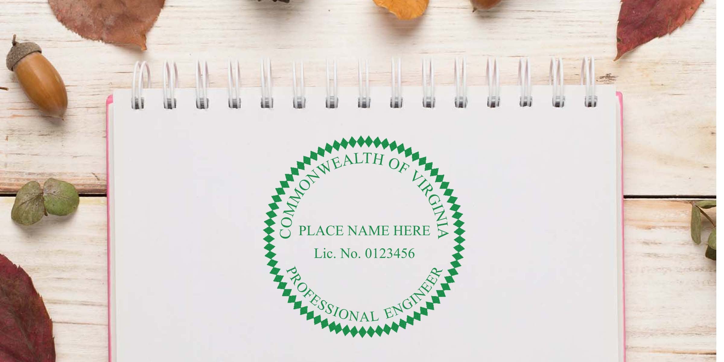 Virginia professional engineer license seal with unique design and stamp on a notebook, set against autumn leaves and acorn background.