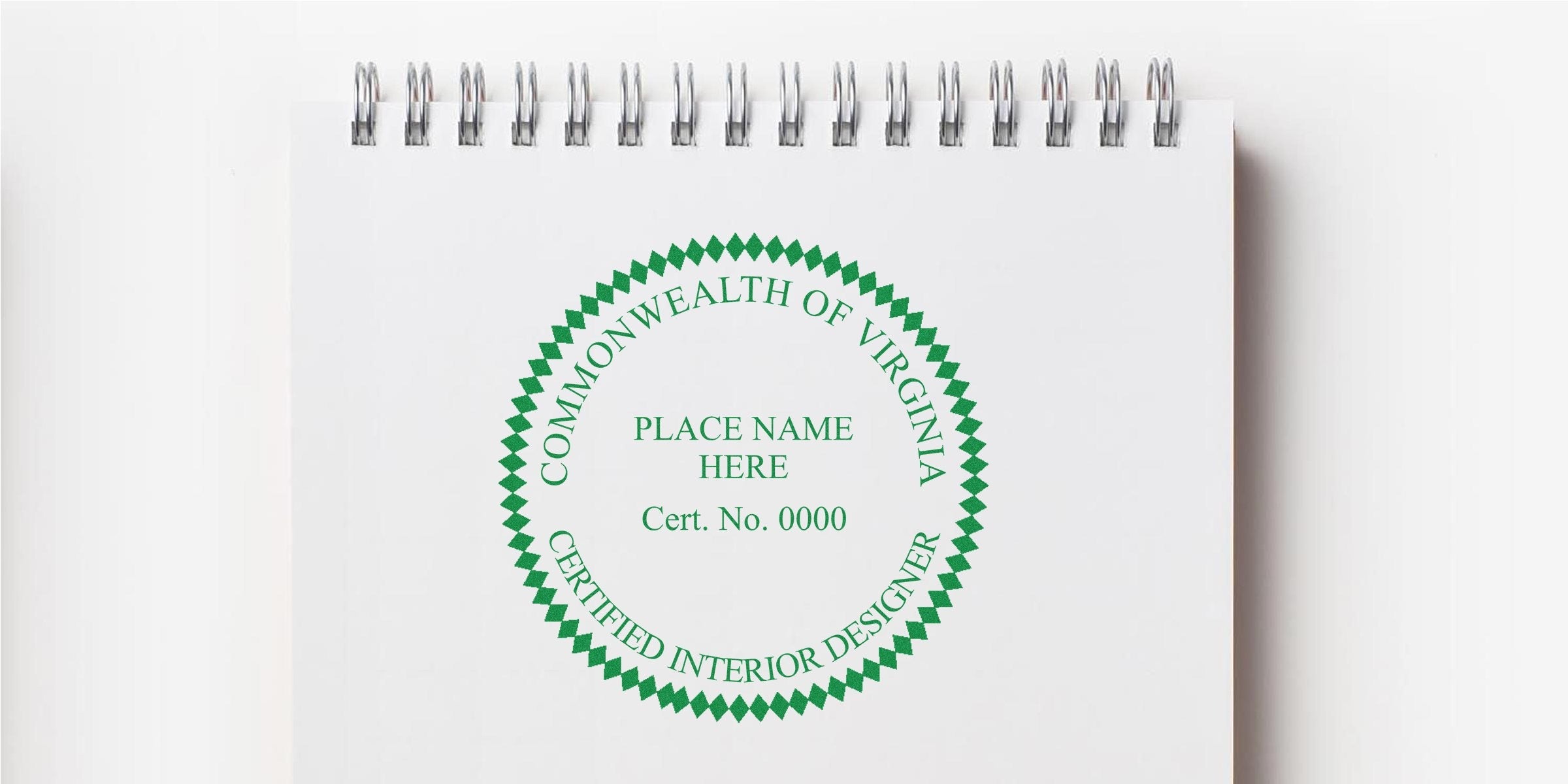 Virginia interior designer stamp with the Commonwealth of Virginia certified interior designer seal on a white spiral notebook, symbolizing interior design licensing in Virginia.