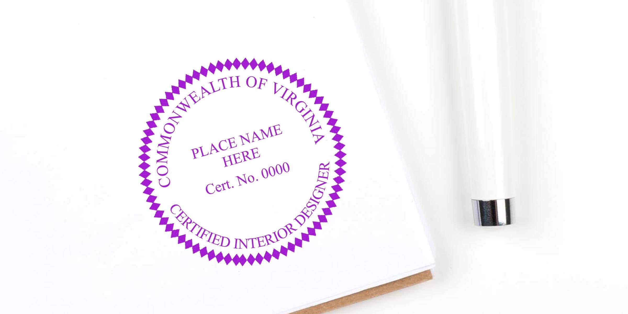 Virginia certified interior designer stamp on white paper with pen, showing Virginia interior design rules and stamp requirements.
