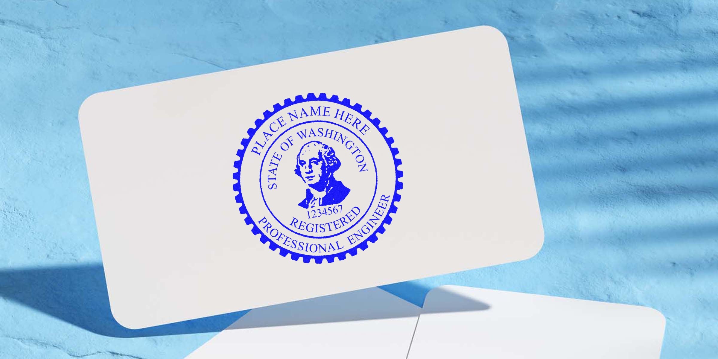 Washington professional engineer seal on white card with blue background, showing seal size and specifications.