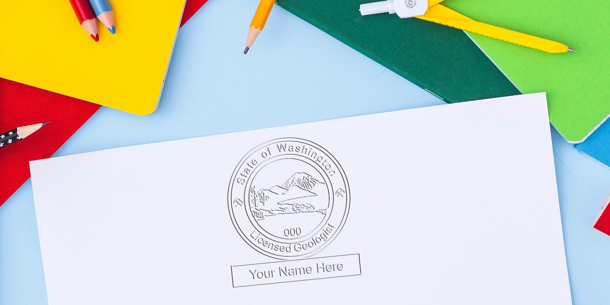 Washington licensed geologist certificate with Geologist Seal, surrounded by colorful school supplies and pencils on a blue background, highlighting Geologist Seal specifications.